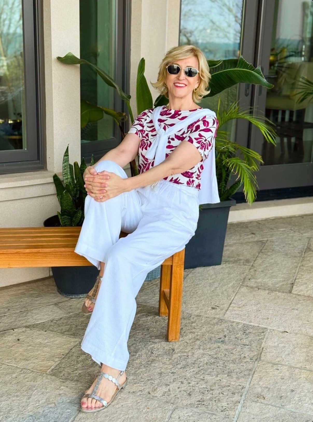 Easy, breezy, and feeling a bit coastal today 🌸🤍

A floral tee paired with white linen pants just feels like the kind of outfit you can wear anywhere and instantly feel put together without trying too hard. I’ve added a white sweater casually tied over my shoulders for that “just in case” layer, and finished it off with simple silver sandals for a little bit of shine.

Simple pieces, but together they just feel right ✨

#LTKSeasonal #LTKOver40 #LTKgrwm