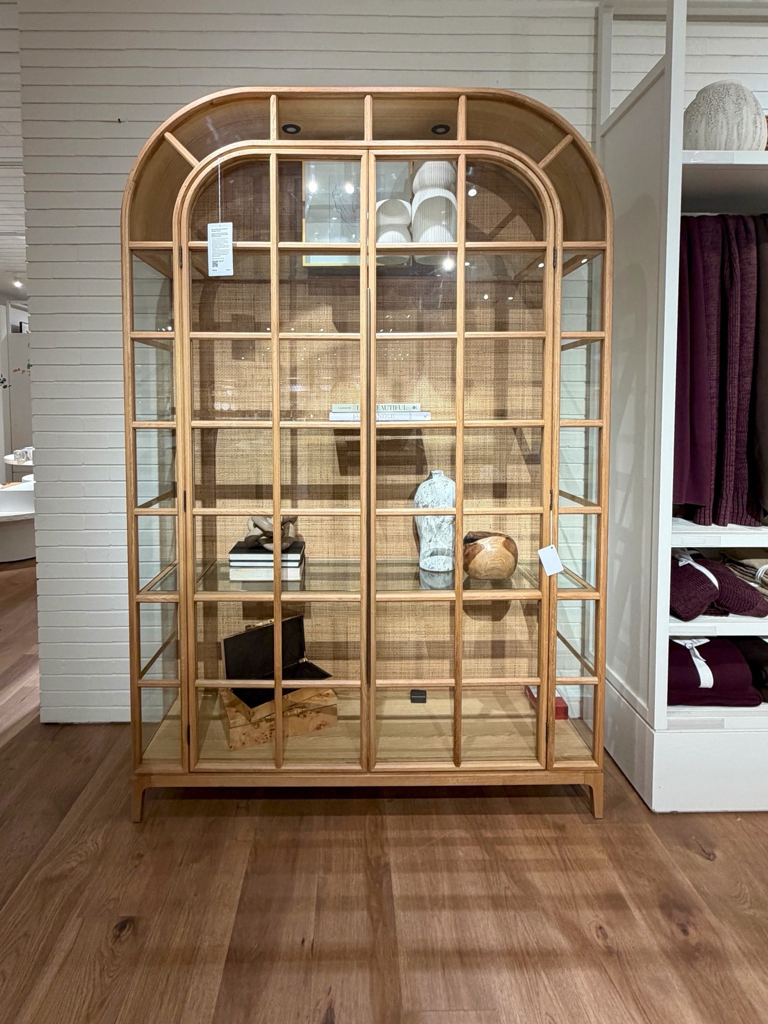 The Atrium Display Cabinet from Crate & Barrel in Natural features beautiful oak framing with glass panels all around, giving it that open, airy look while putting your favorite pieces on display. ✨ The built-in lighting adds the perfect finishing touch, and I love that it now comes in a smaller size for more spaces! 💫 I’ve linked it and similar styles in my LTK! 😍 @Crate & Barrel  #storagecabinet #displaycabinet #glasscabinet

#LTKHome #LTKSaleAlert