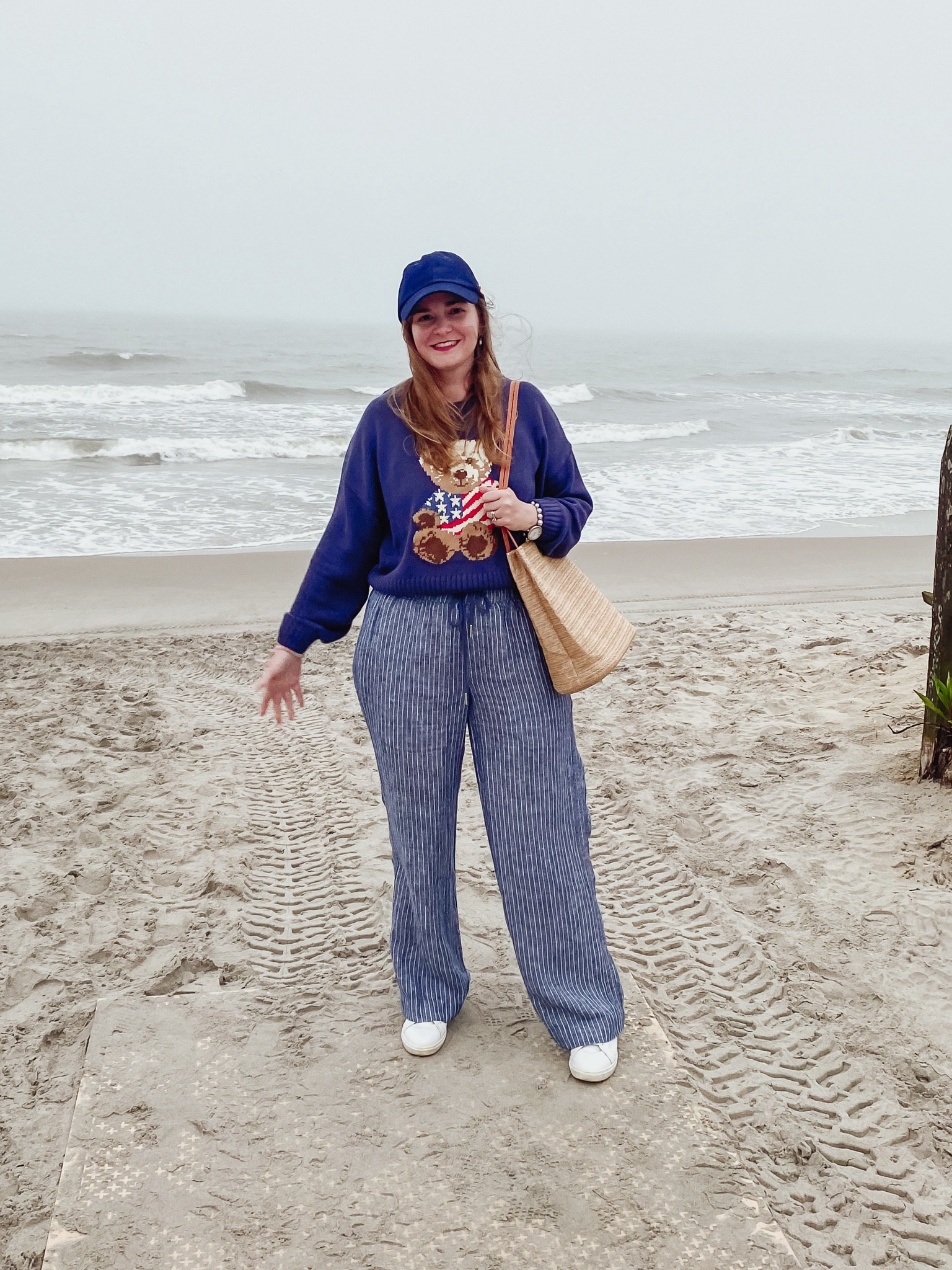 Teddy bear American flag sweater 
Striped linen pants 
Sneakers 
Straw tote bag 

#LTKSummerEdit #LTKFindsUnder100 #LTKSeasonal