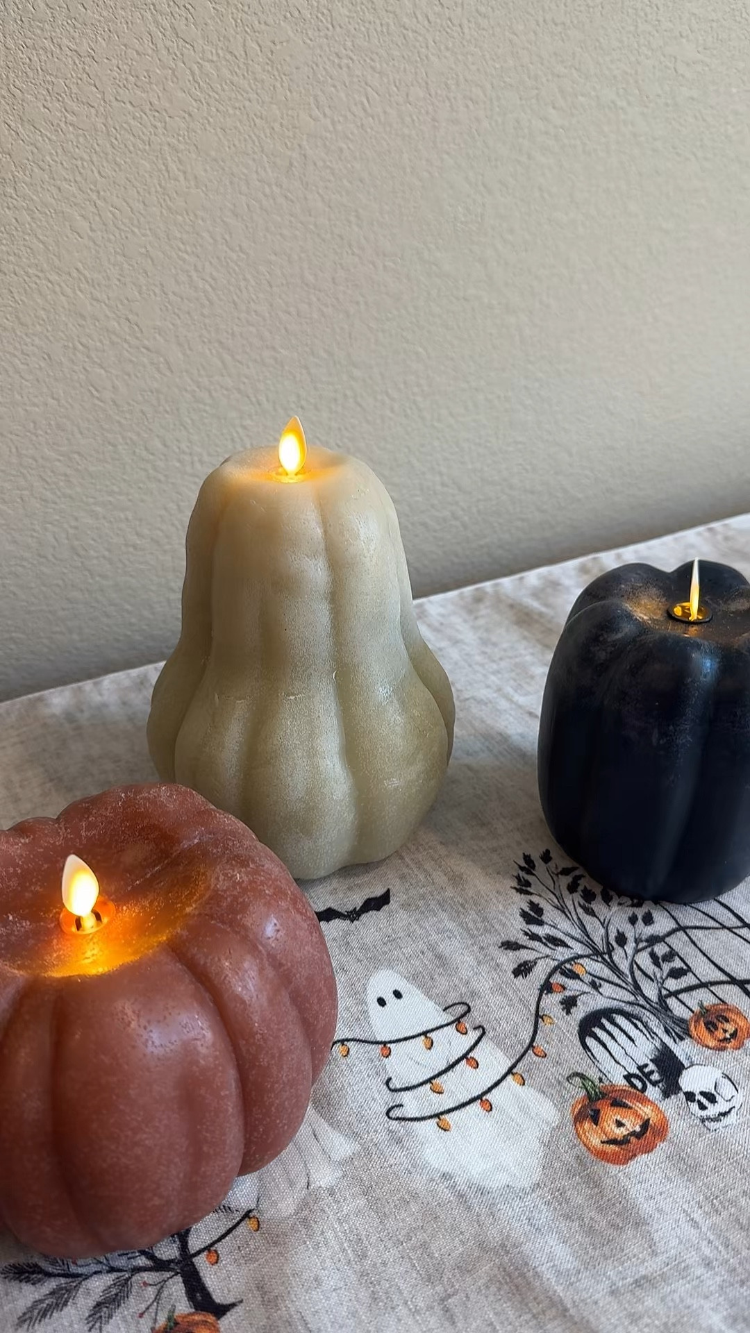 There are four premium flameless candles in this pottery barn pumpkin candle set. Each can be turned on and left on, and will run for 200 hours on two AA batteries, or you can turn on the timer and they will run for five hours before shutting themselves off. If left on timer mode, they will come back on for five hours again each day at the same time. 

#LTKSeasonal #LTKHome