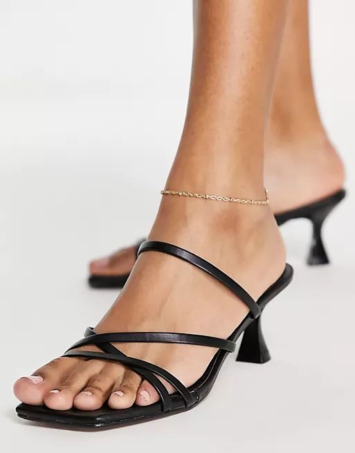 ASOS DESIGN Hart strappy mid heeled mules in black | ASOS (Global)