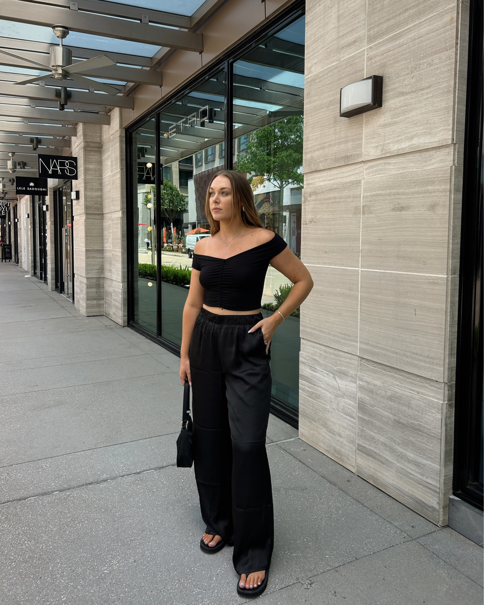 pants. like shorts, but longer - chandler bing 🤪 ⁠
⁠
it's too hot for sweatpants in the summer so insert ✨satin pants✨ perfect for a casual street style look or throw on some heels for a dressier dinner fit. i have a feeling this trend will sprinkle right in to fall + i'm so excited! outfit details below + linked on my LTK! ⁠
⁠
- top + pants @dynamite⁠ (M + M)
- sandals @abercrombie ⁠
- bag + jewelry @amazonfashion⁠
.⁠
.⁠
.⁠
.⁠
trendy fashion, trendy outfit, summer to fall outfit, summer outfit, summer style, date night outfit, minimalist style, Pinterest outfit, casual chic style, Pinterest style, Pinterest girl, easy outfit, outfit of the day, ootd, nyc street style. #casualoutfitideas #pinterestoutfit #comfycasual #casualchicstyle 

#LTKstyletip #LTKunder100 #LTKFind