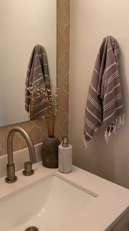 Powder room with cross & star tile, frameless mirror, 2modern wall sconce, pottery barn vanity, widespread bathroom faucet in a brushed nickel finish.

Home decor, interior design, half bath, styling, home accessories. 

#LTKstyletip #LTKFind #LTKhome
