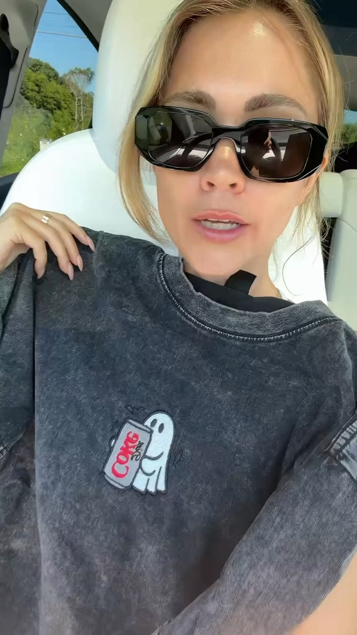 The cutest ghost holding a Diet Coke!
