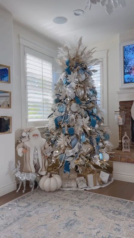 My gorgeous Christmas Tree this year from King Of Christmas! Get my exact tree below, and my beautiful candle from Voluspa

I also linked some similar faux fur stockings 
#christmas #tree #christmastree #kingofchristmas #decor #holidays #blue #steelblue #santa #style #design 