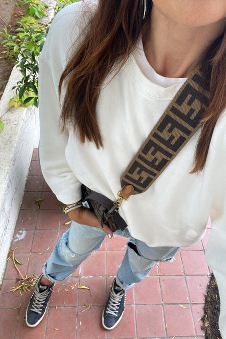 Golden Goose fit Tts 
Elwood sweatshirt fits large and is not gender specific I wear small so soft and comfy 
Mousy jeans 