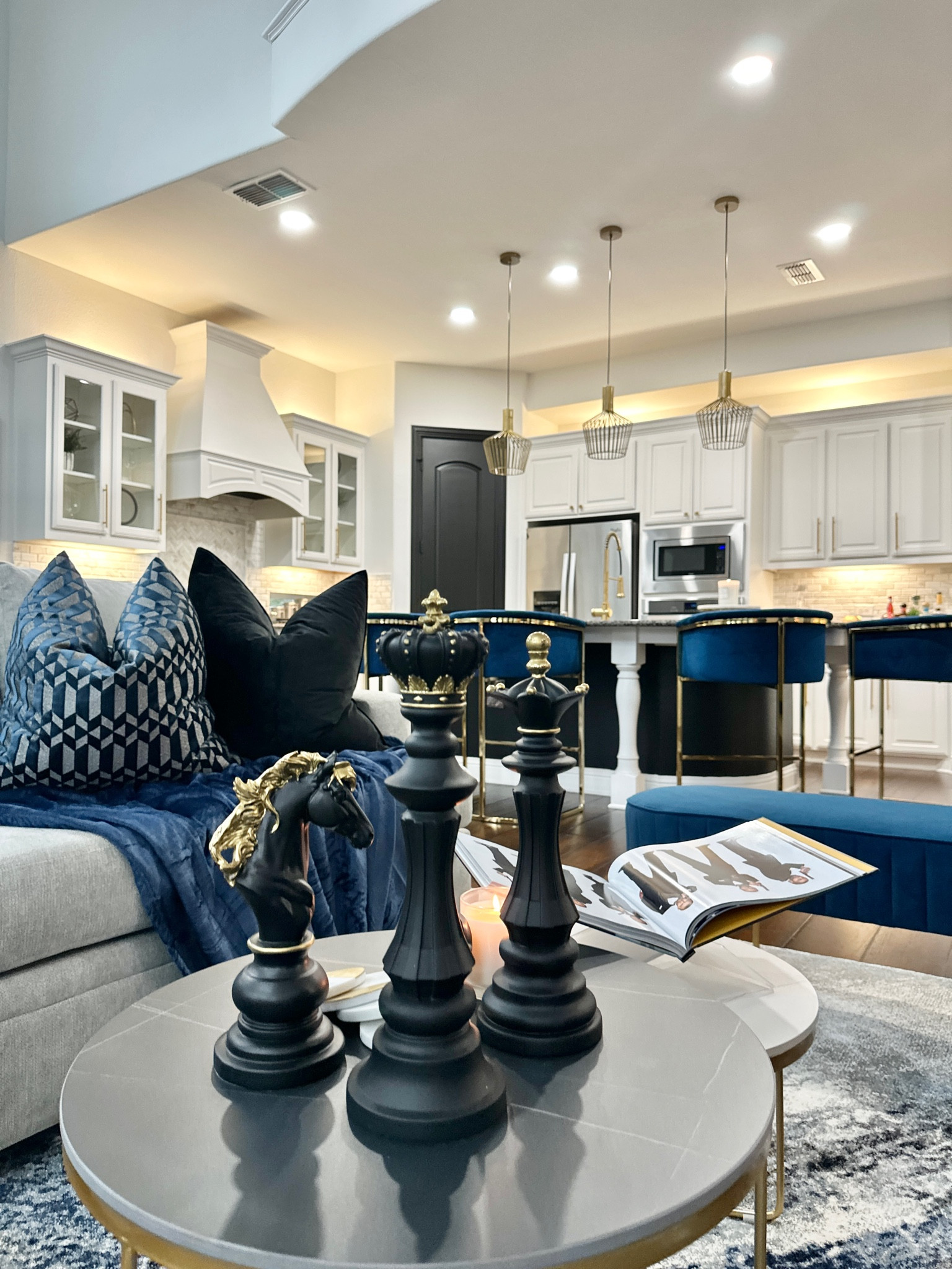 Living Room + Kitchen Decor: Rug • Barstools • Pillows • Coffee Table • Chess Sculptures • Pendant Lights • Book Stand • Book • Throw Blanket 

#LTKfindsunder50 #LTKhome #LTKsalealert