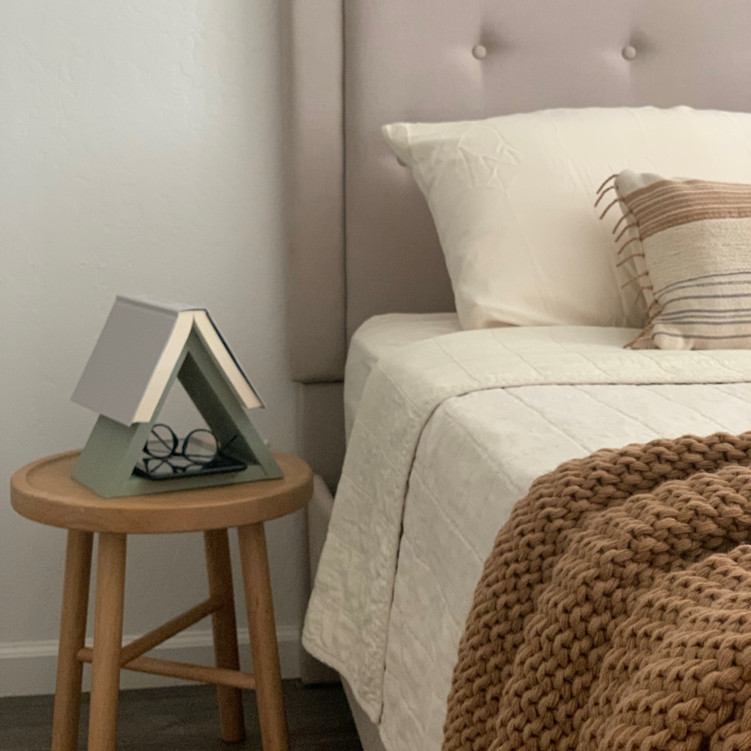 Bedroom with upholstered bed, side table, bedding, quilt, and throw blanket! 


#LTKfindsunder100 #LTKhome