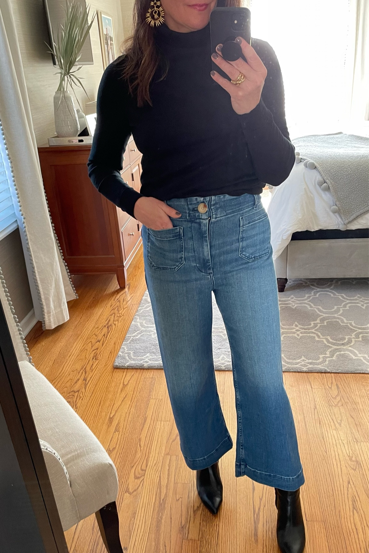 Wide leg cropped jeans are trending this spring, and this pair is a great option and under &160! Pair with a classic, slim fit black turtleneck and ankle boots for a wear-it-now look! Linked on LTK. 