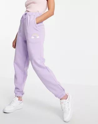 ASOS DESIGN set oversize sweatpants with carebear graphic in lilac | ASOS (Global)