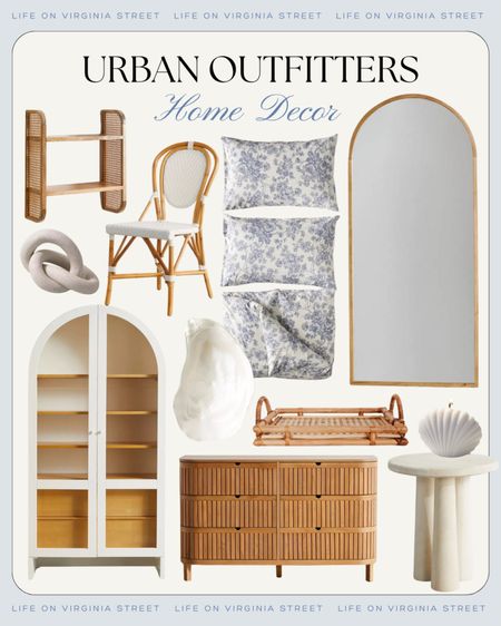 Cute new spring decor and furniture arrivals from Urban Outfitters! I’m loving this arched cabinet (comes in multiple colors!), cane shelf, gold floor length mirror, blue and white floral bedding, cane tray, seashell catchall, fluted wood dresser, bistro dining chair and more!
.
#ltkhome #ltksalealert #ltkfindsunder50 #ltkfindsunder100 #ltkstyletip #ltkspringsale #ltkseasonal neutral decorating ideas, coastal decor 

#LTKsalealert #LTKhome #LTKSpringSale