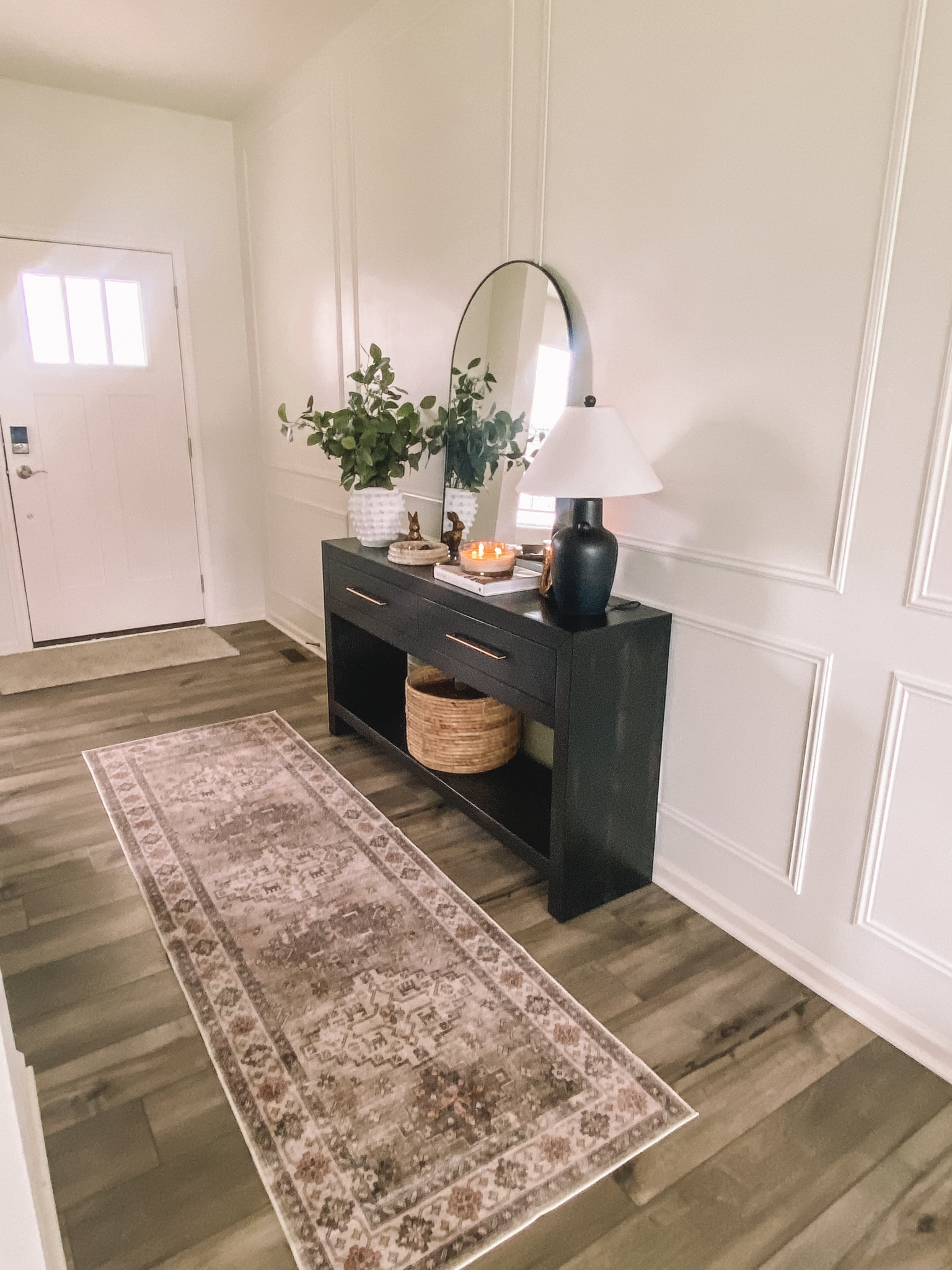 Entryway table. Foyer. Washable rug  
