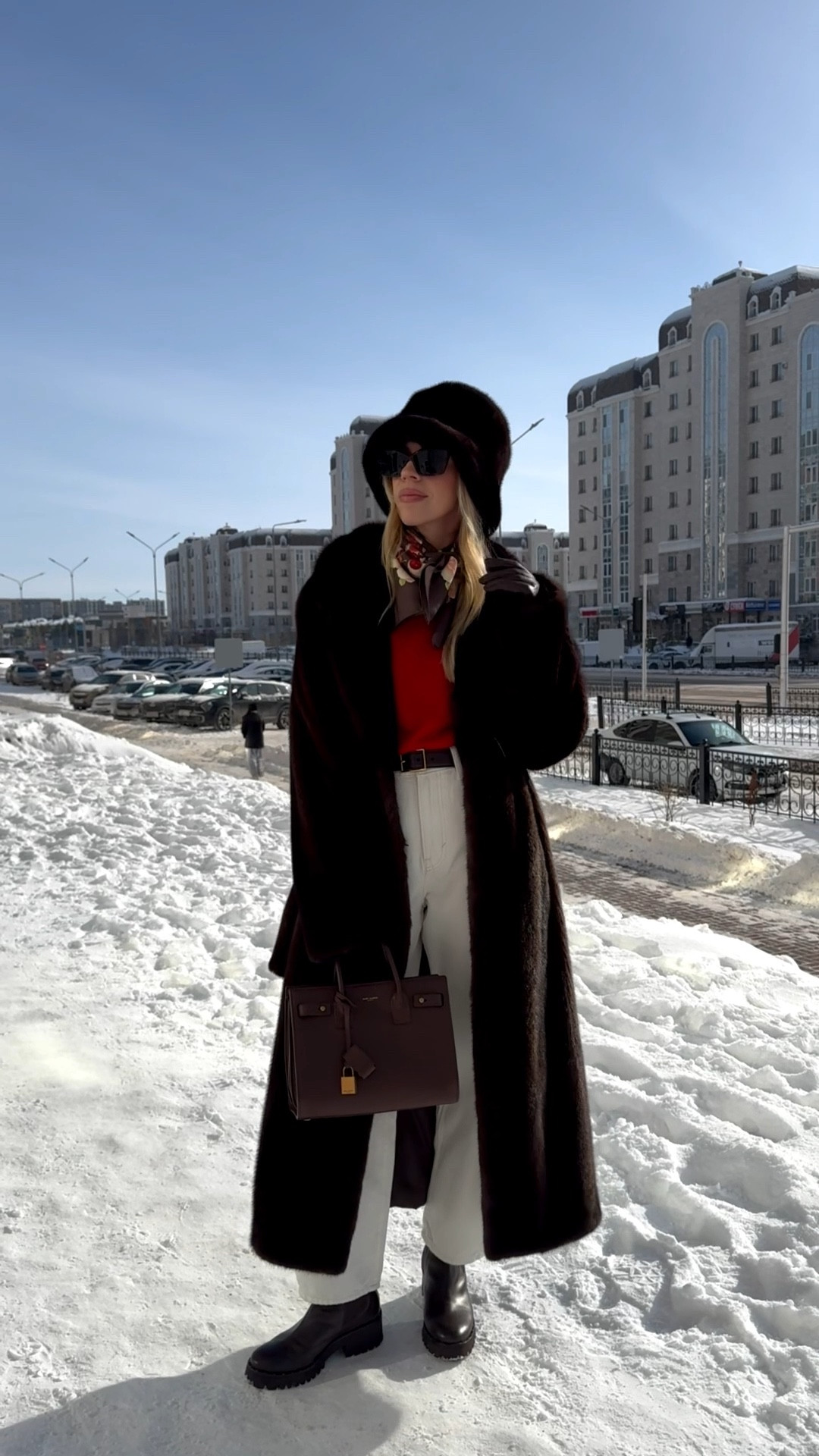 Chocolate brown fur coat, fur bucket hat, brown and red outfit, silk scarf, white barrel jeans, lug sole boots

#LTKSeasonal #LTKOver40 #LTKSaleAlert