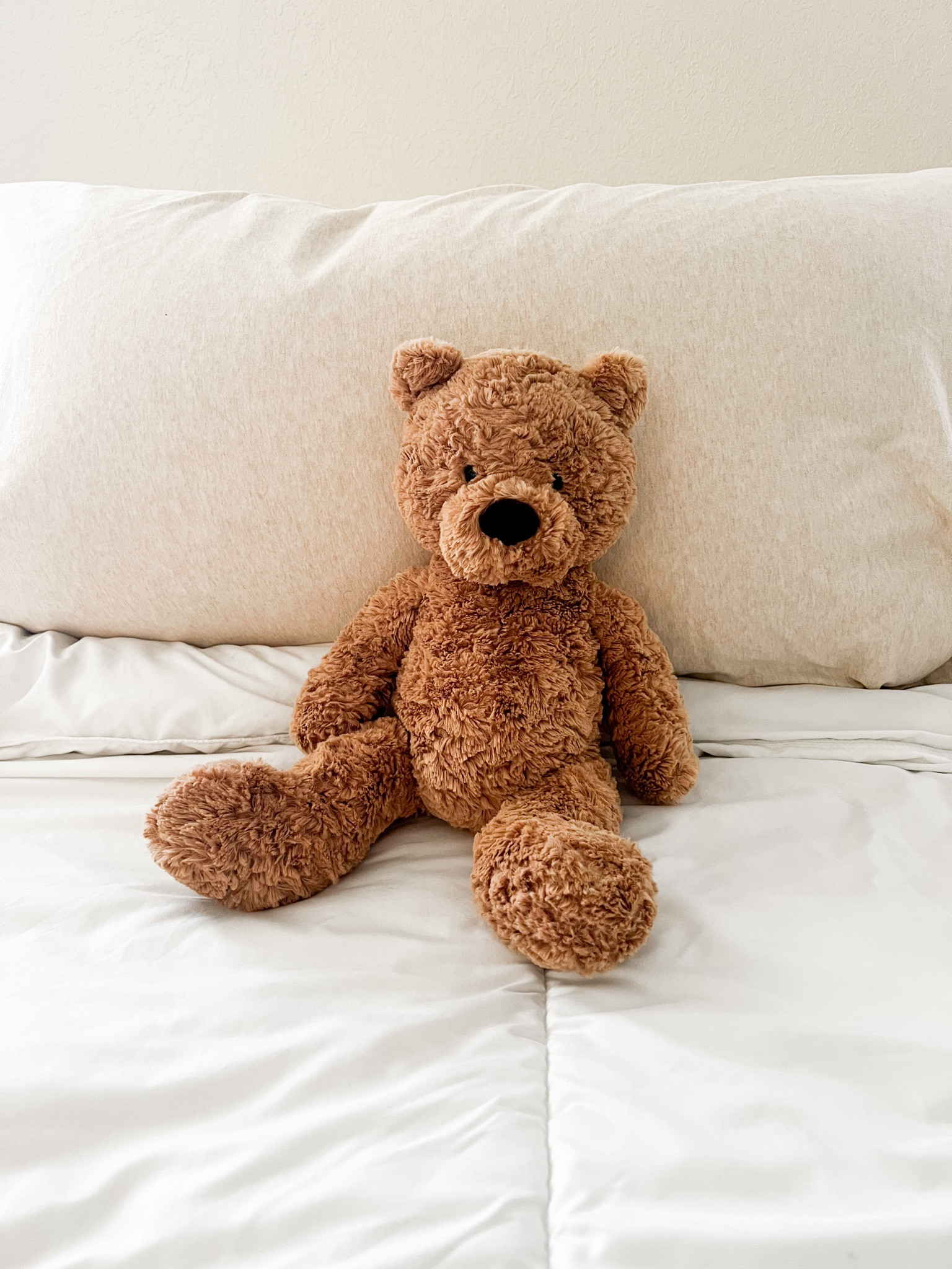 Bumbly Bear by Jellycat is my son's absolute favorite stuffy! This is the size medium and he's the perfect size for toddler hugs. 🥰 all of Jellycat's stuffies are incredibly soft and snuggable. Not to mention super cute. We love all of them! 

#LTKbaby #LTKkids #LTKMostLoved
