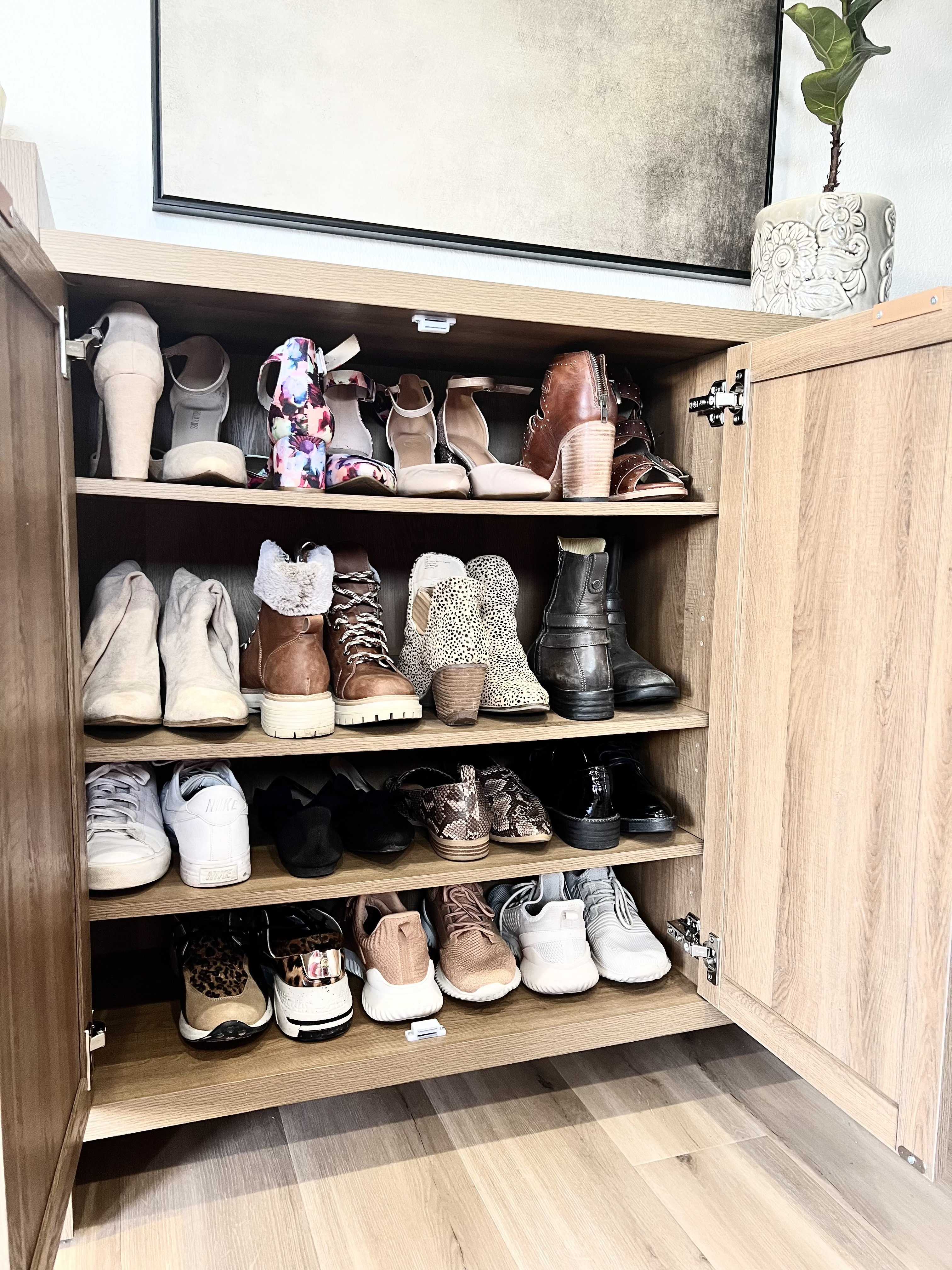 This shoe cabinet holds so many shoes and keeps them out of sight. It’s beautiful and easy to put together! 

#LTKShoeCrush #LTKFamily #LTKHome