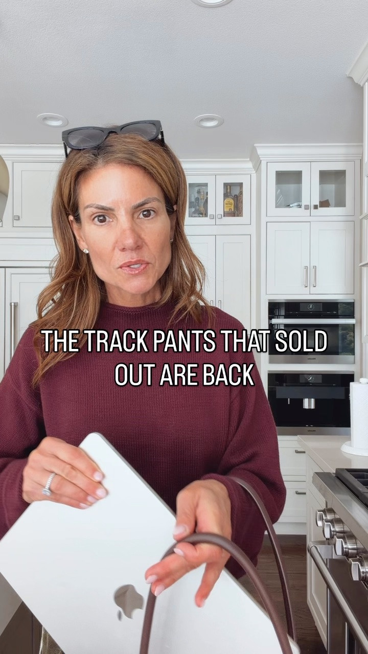Fall track pants are BACK IN STOCK and this lightweight cord version is such an easy way to update your fall wardrobe. I love the sporty stripe—and matching the plum sweater and burgundy shoes to it made the whole outfit come together.

The pants also come without the stripe if you want a more classic look. And this bag is such a good one for work or travel—it fits a computer and attaches to your suitcase.

I am 5'7" tall and wearing a size small in the sweater and an extra extra small in the pants, they run large. I would size down one full-size.

#LTKootd #LTKOver40 #LTKWorkwear