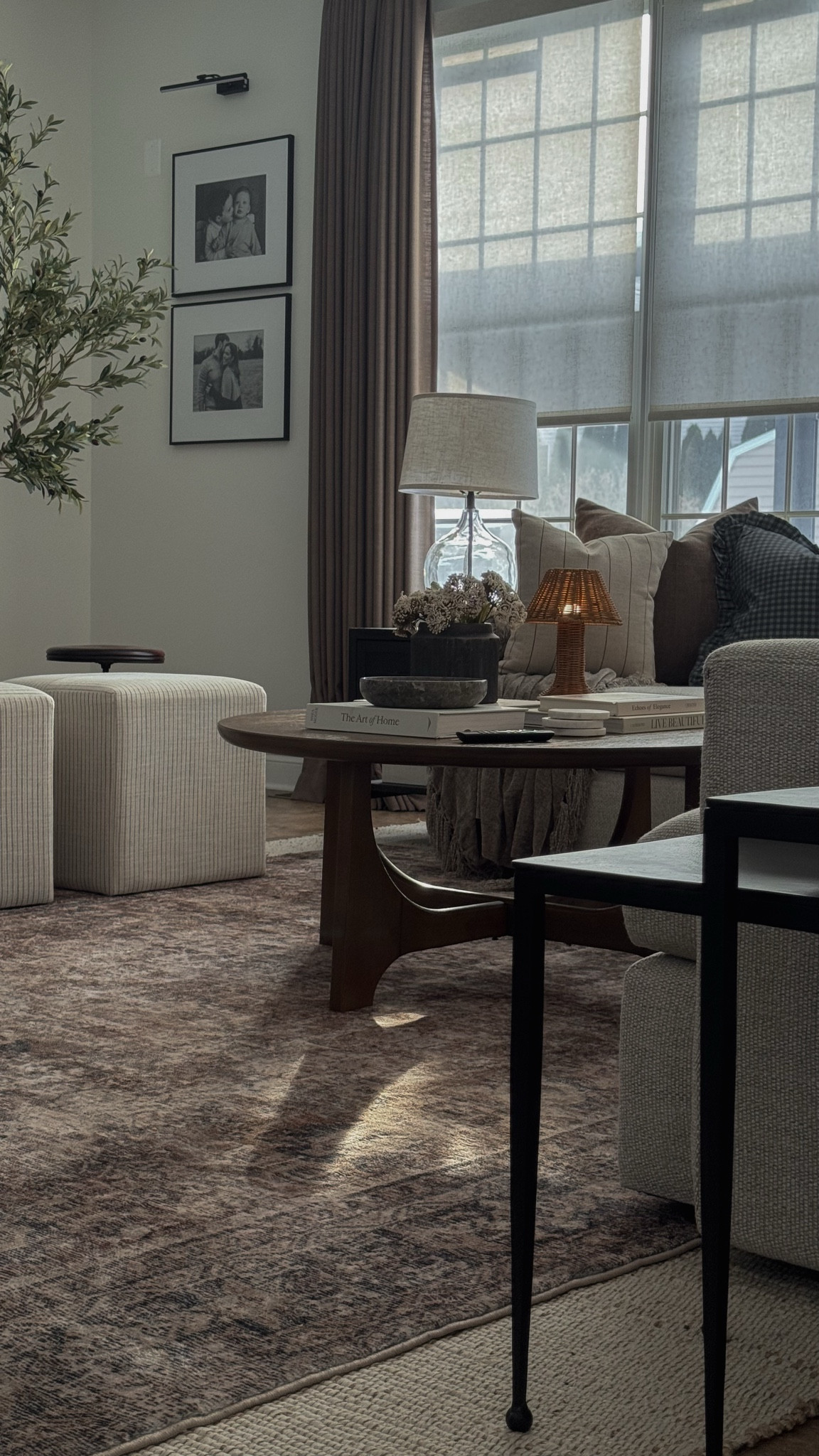 Coffee table decor, round coffee table styling, living room decor, ottomans, living room furniture, living room curtains, smart Roman shades, end table, table lamp, sectional sofa ￼￼

#LTKSeasonal #LTKHome