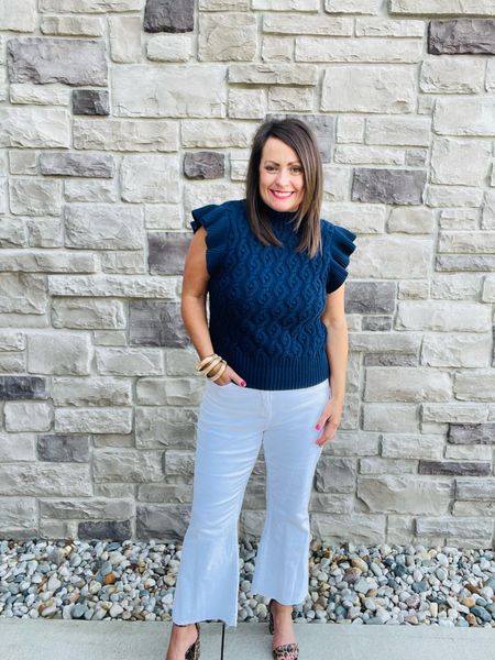 The white kick flares are spring perfection!!!  And how about this flutter sleeve cable knot sweater???

#LTKstyletip #LTKsalealert #LTKover40