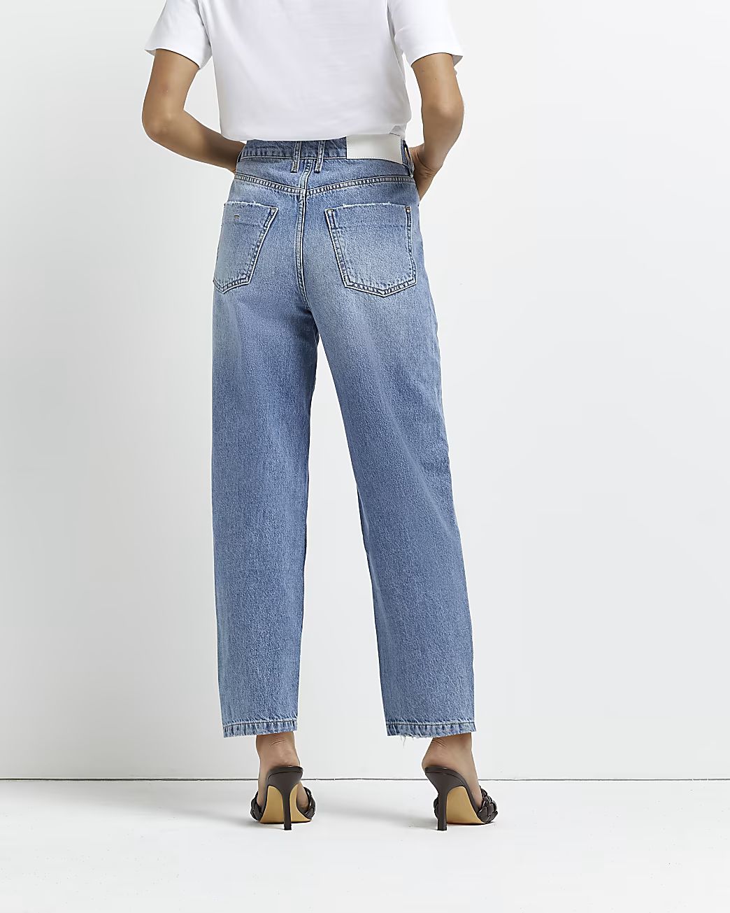 Petite blue high waisted tapered jeans | River Island (UK & IE)