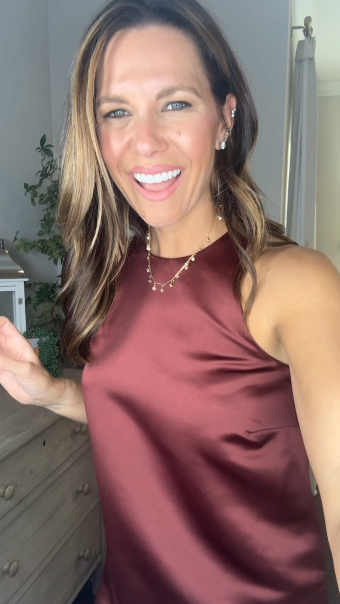 Such a gorgeous wine colored dress from Target (and it has the cutest pearl button close in the back).  I sized down 1 size to XS for the fitted look you see 

#LTKHoliday #LTKSeasonal #LTKParties