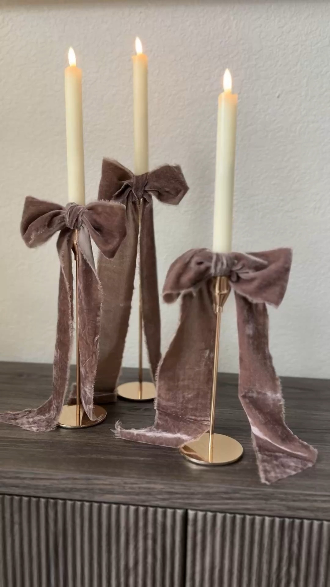 Candles ( flameless on a timer with a remote of course), gold candlesticks, and big velvet bows I made from the most beautiful frayed edge velvet ribbon all add up to be the perfect vibe for my living room this Christmas it FEELS fancy even if they’re all super affordable from Amazon ! 

#LTKHoliday #LTKHome