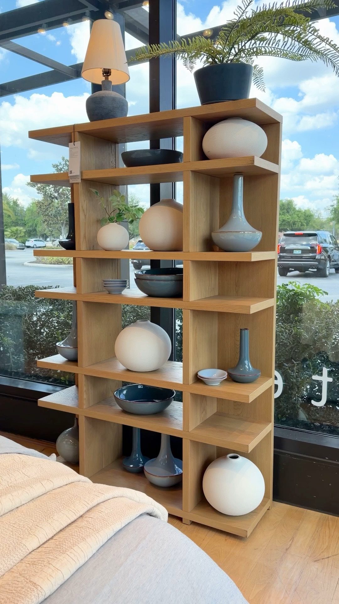 The Wallace Modular Shelf Unit from West Elm in the Blonde finish stands out with its striking perpendicular lines and airy open design. 🤩 The warm wood tones keep it feeling light and natural while giving the space a subtle mid-century modern vibe. 🫶🏻 Such a great piece for displaying books, vases, and favorite home accents while adding architectural interest to the room. 📖 #WestElm #MidCenturyModern #BookShelf

#LTKHome #LTKSaleAlert