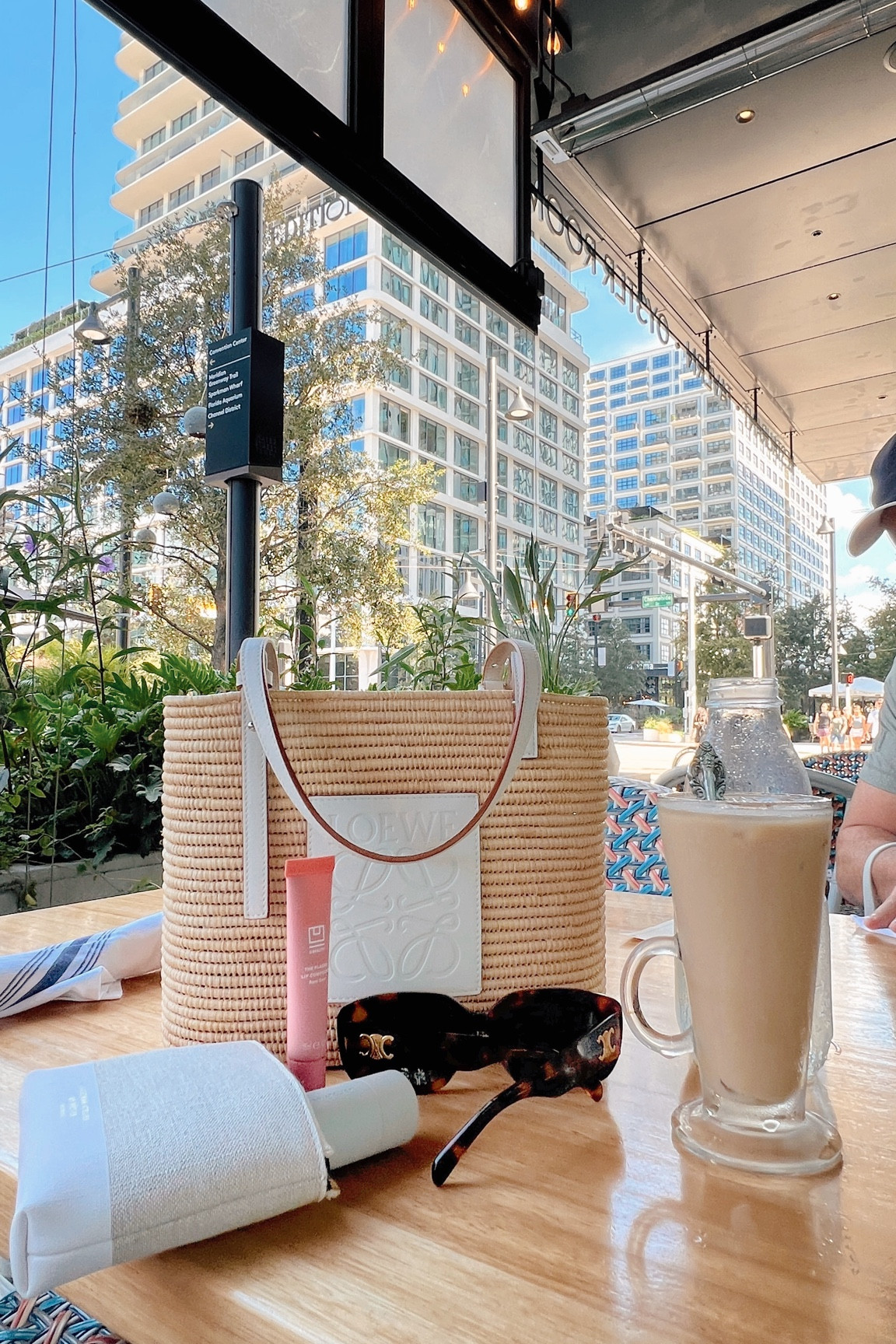 Summer raffia bag tote from Loewe, U Beauty Lip Plasma Rom-Com, Celine Sunnies

Small pouch from Westman Atelier (not linked)

#LTKItBag #LTKBeauty