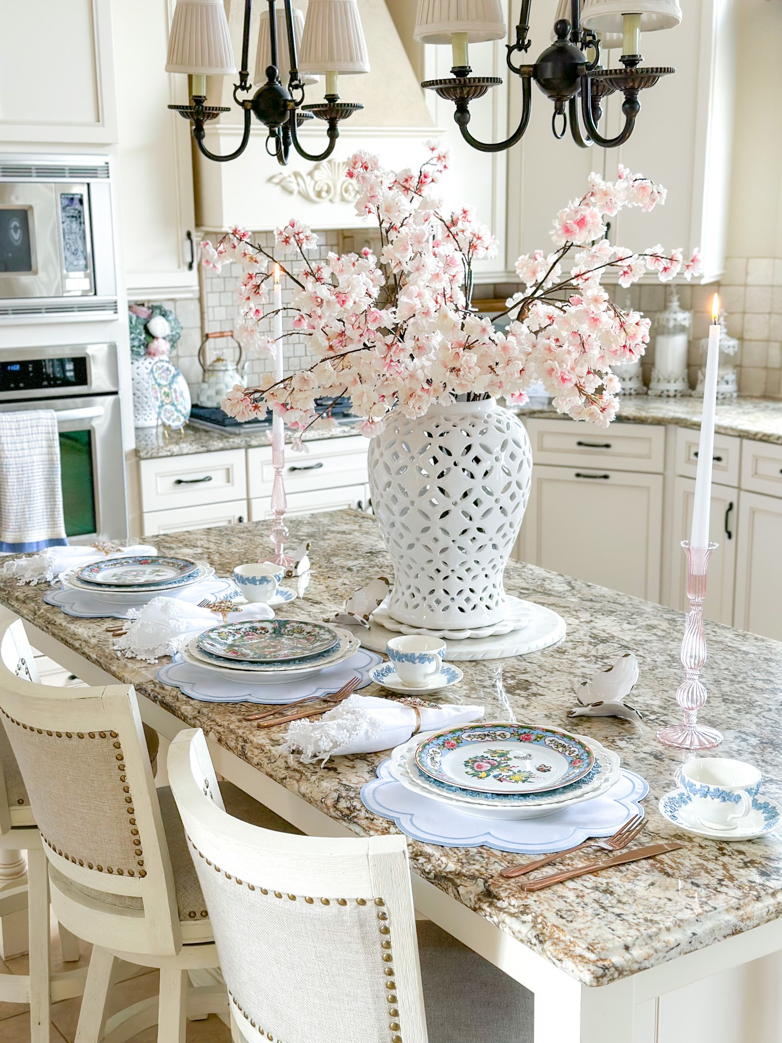 Spring Kitchen Counter tablescape with cherry blossoms and famille rose plates. Blossoms are currently on sale and select famille rose pieces on clearance! Such a beautiful, timeless collection!

Ginger jar, marble tray, petal tray, pink candleholders, Wedgwood, Williams Sonoma, rose gold flatware, scalloped charger, lace napkins, butterfly decor

#LTKsalealert #LTKhome #LTKSeasonal