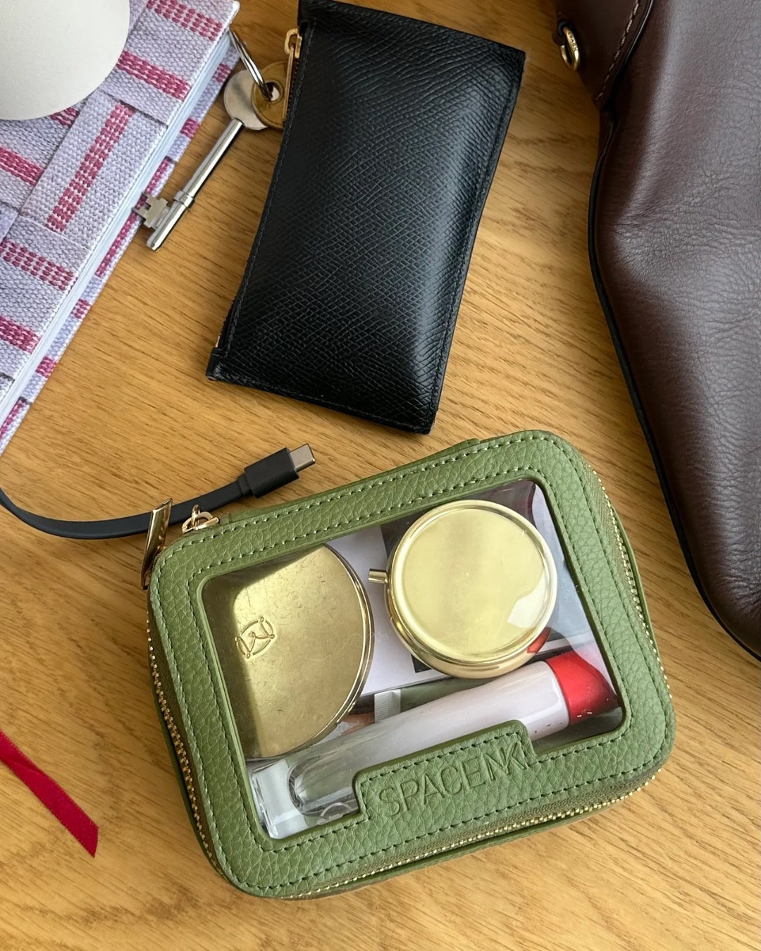 I carry this Space NK Mini Travel Bag at all times anyway, but on holiday it really comes in handy.

#LTKtravel #LTKbeauty #LTKbag