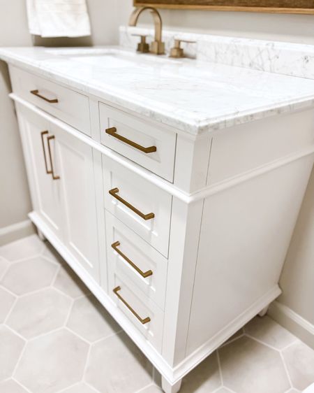 We love this vanity from Home Depot. Perfect for Wells bathroom and has tons of storage. I swapped out the hardware to match the sconces✨

Home Depot, bathroom, primary bathroom, guest bathroom, powder room, half bath, vanity, modern style, traditional style, bathroom inspiration, Interior design, shoppable inspiration, curated styling, beautiful spaces, classic home decor, bathroom styling, style tip, look for less, designer inspired




#LTKHome #LTKFamily #LTKStyleTip