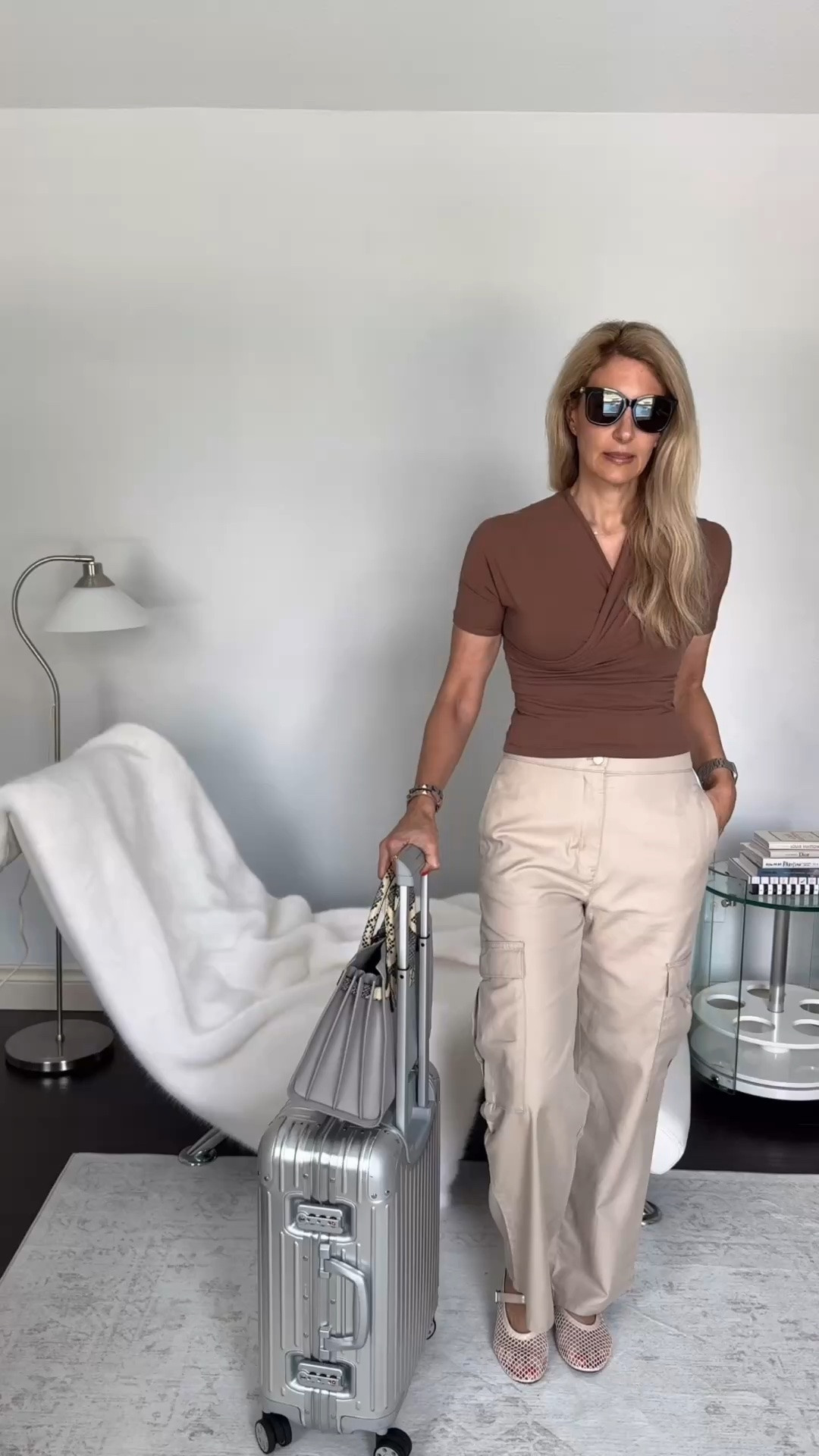 Travel day outfit alert! Loving these minimum wrinkle pants with the chocolate top. Keeping the accessories to a minimum in case I need to take them out at the security checkpoint. Pairing with these shoes to elevate the look plus they are super comfy for the long airport walk.

Top: Skims
Pants: Calvin Klein
Shoes: Amazon
Bag: Saint Laurent
Sunnies: Gucci

#LTKTall #LTKTravel #LTKdayinmylife