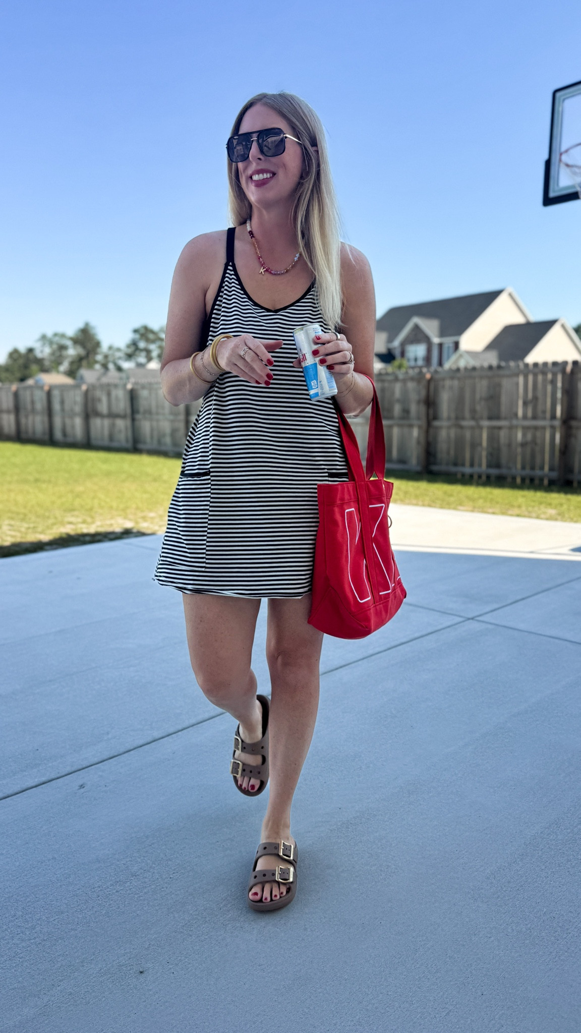 This striped active dress has built in shorts! So cute and comfy for mom on the go summer activities!

#LTKootd #LTKmomlife