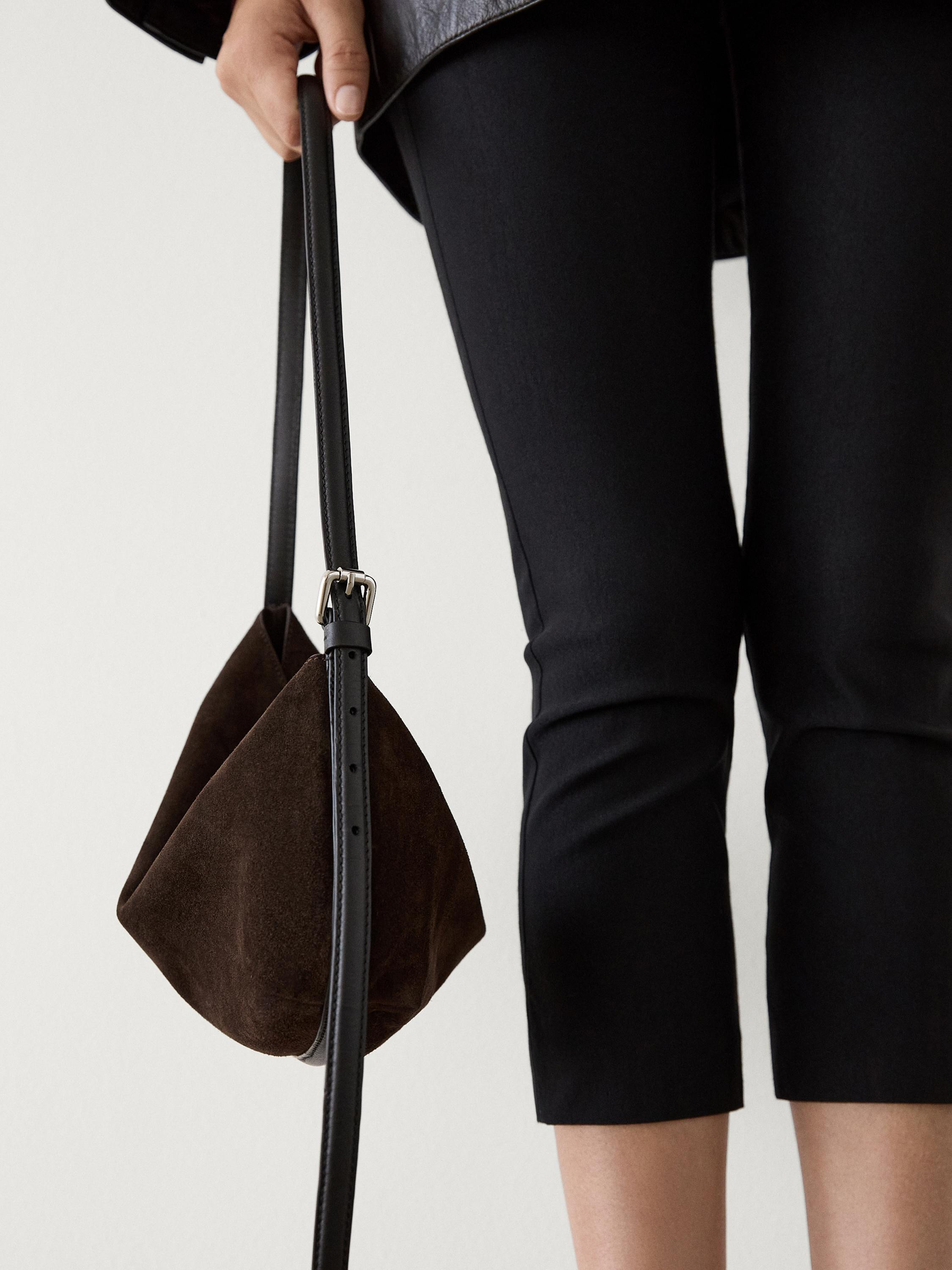 Split leather half-moon bag  £129.00 Shoulder bag . Main compartment. Flap with concealed magnet... | Massimo Dutti UK