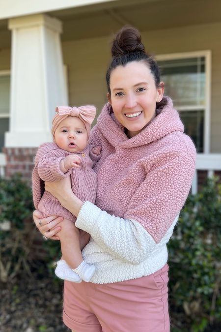 Feeling pretty in pink! 🎀 Evie’s pink kangaroo sweater romper is the softest and now available in tan as well! My teddy pullover is out of stock in pink but I have found similar hoodies linked here! 

#LTKbaby #LTKsalealert #LTKfamily