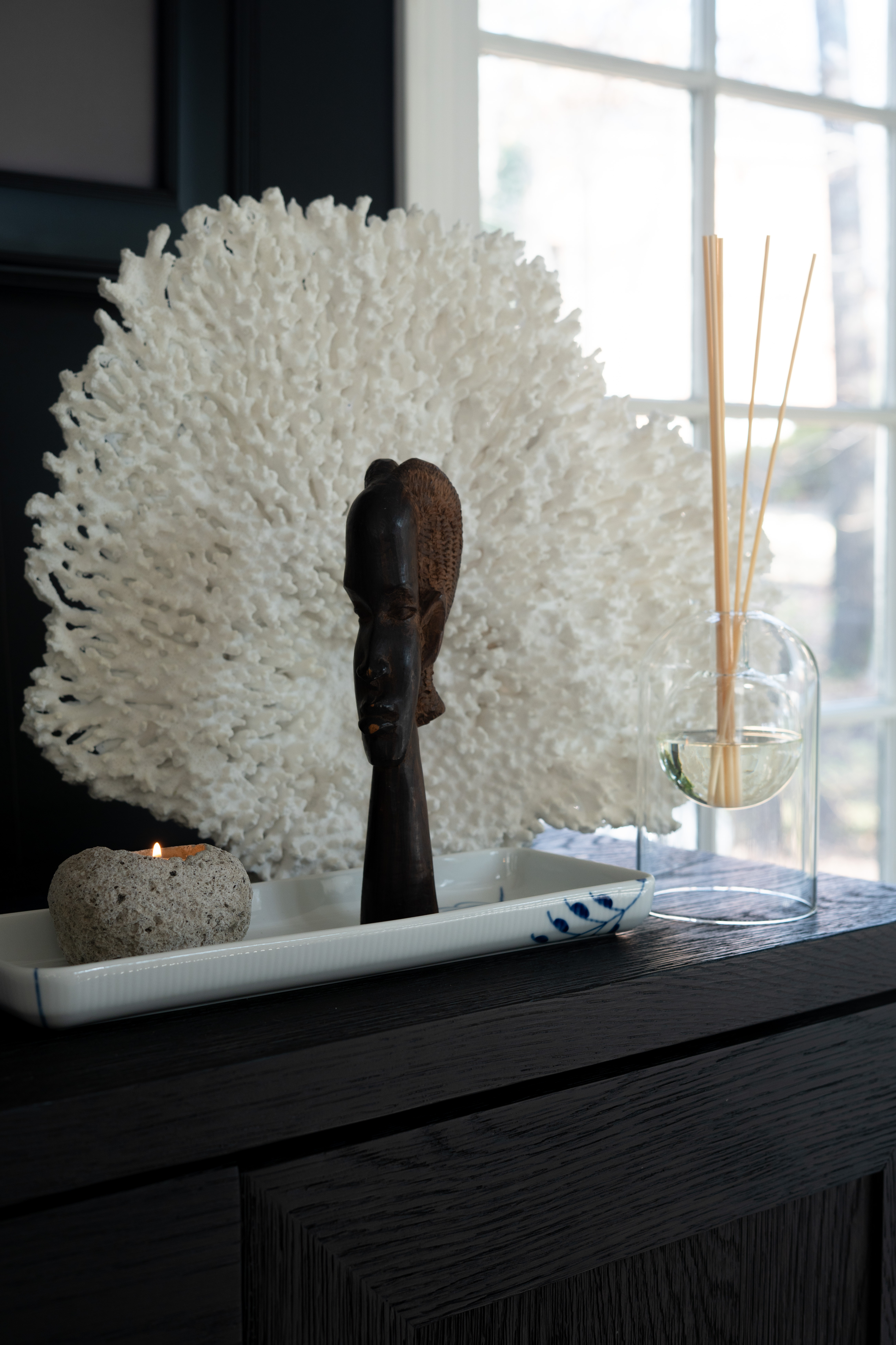 I love creating little styling moments like this throughout the house. The sculptural decor, blue and white dish, soft coral texture, and simple glass diffuser add so much depth and personality to this console. It’s calm, layered, and beautifully balanced. 

 #LTKSpringSale #LTKSeasonal #LTKHome