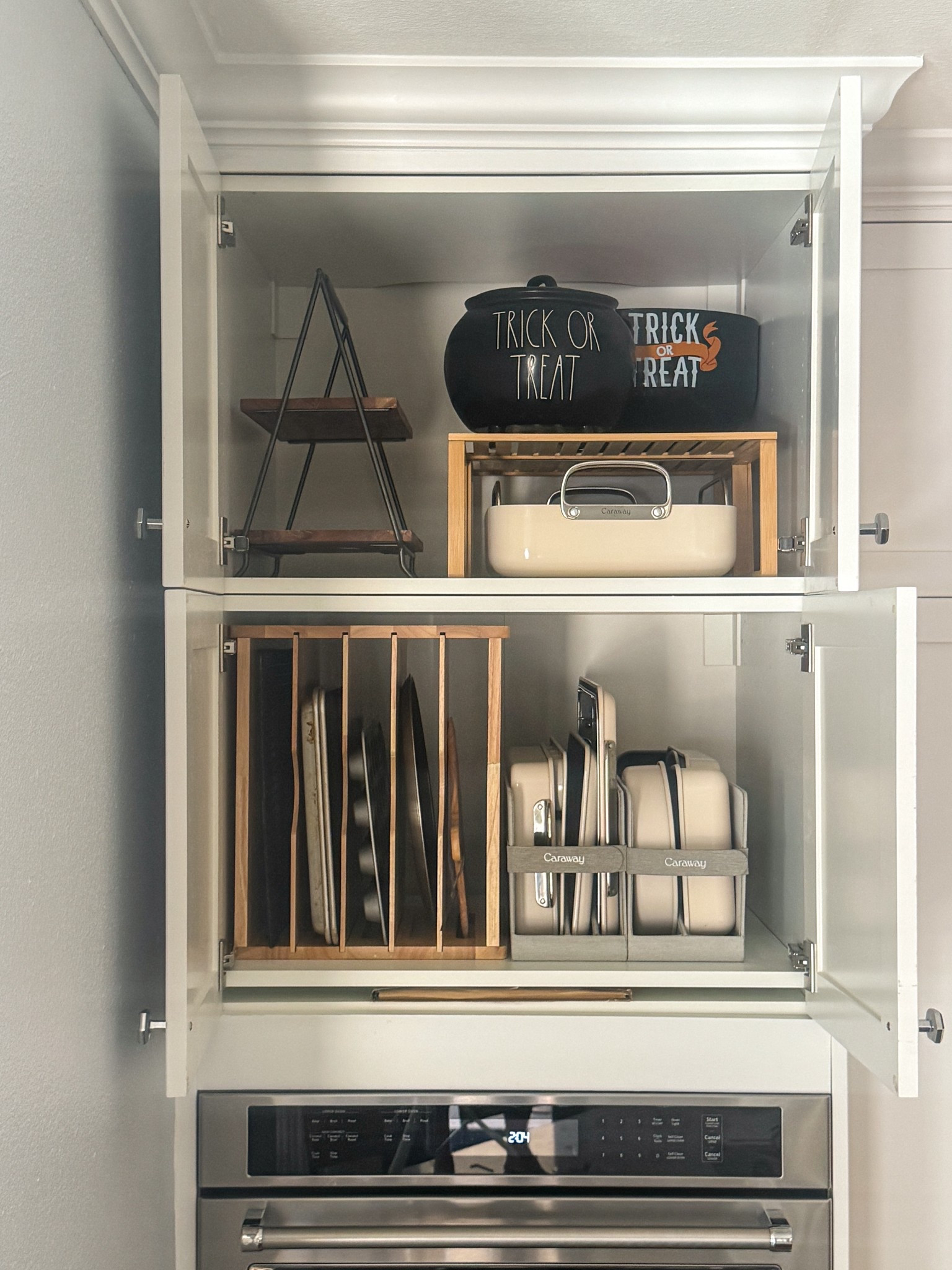 A tray divider makes a huge difference when organizing kitchen cabinets. Save an extra 10% on all Caraway Home non-toxic cookware, bakeware, storage and other kitchen items with code STACYSSAVINGS10

#LTKHome #LTKOver40