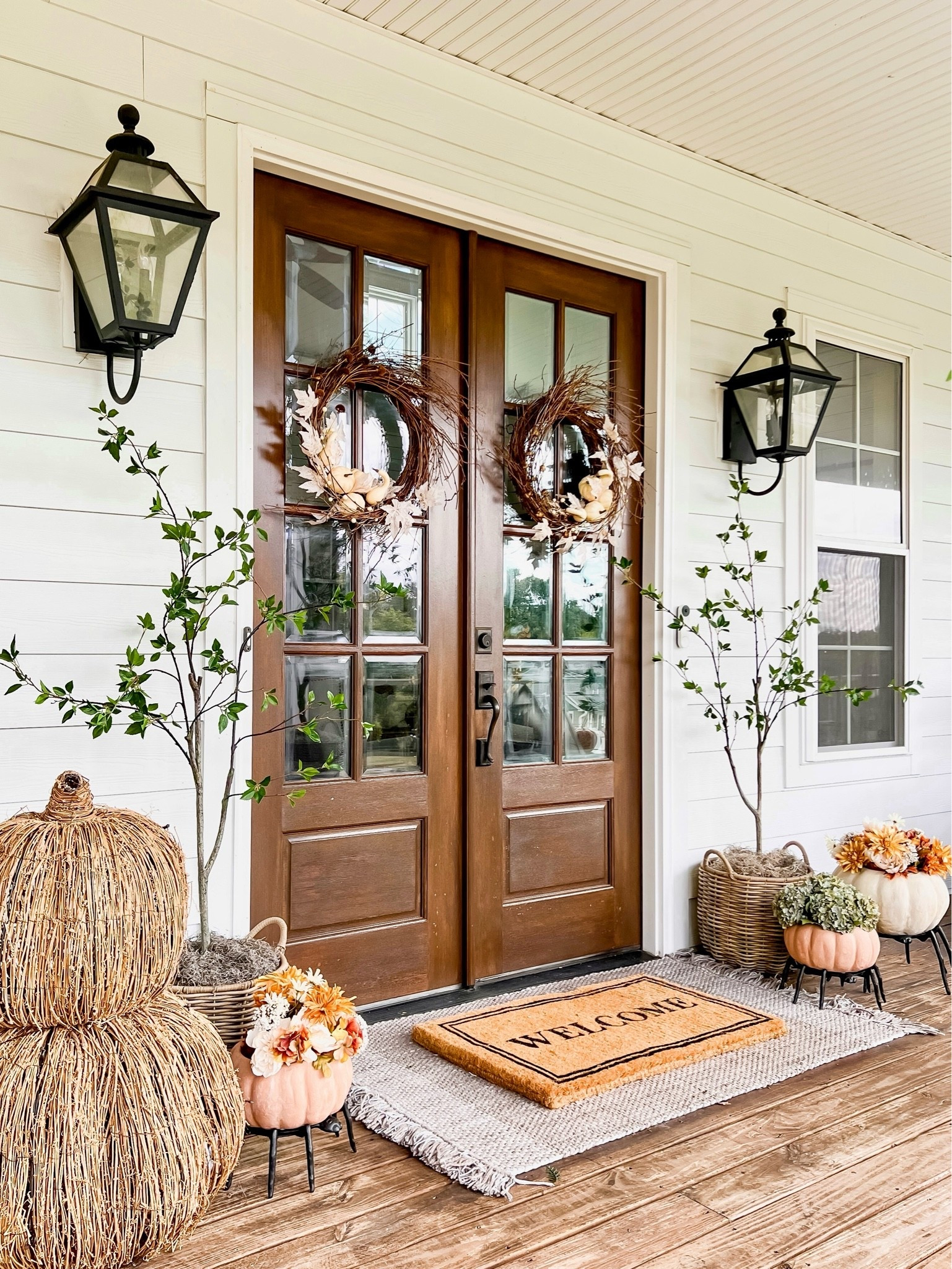 Here’s another fall porch decorating idea for 2026! This was my front doors decorated for fall two years ago in collaboration with pottery barn! It was a nice summer to fall transition with the green trees and I love these pumpkins so much!

#LTKSeasonal #LTKHome #LTKSaleAlert