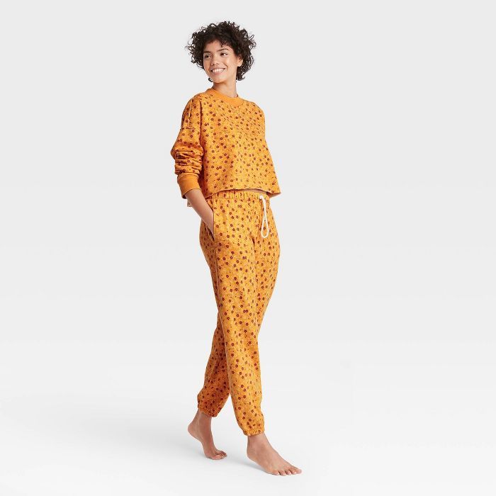 Women's Floral Fold-Over Fleece Lounge Jogger Pants - Colsie™ Yellow | Target