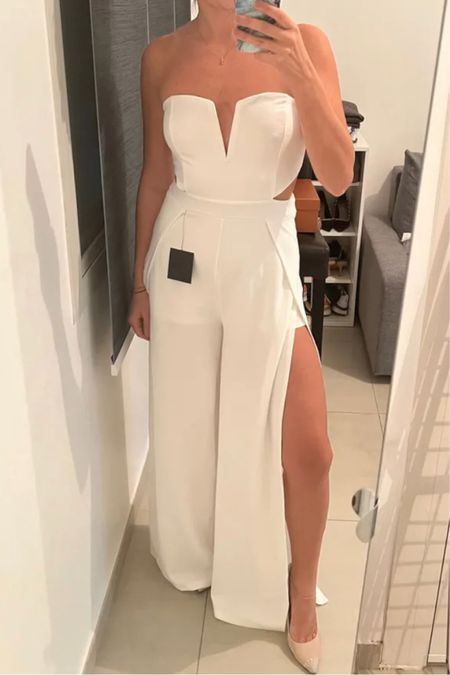 This white jumpsuit fits taller women and is perfect for summer outfits!

#LTKunder100