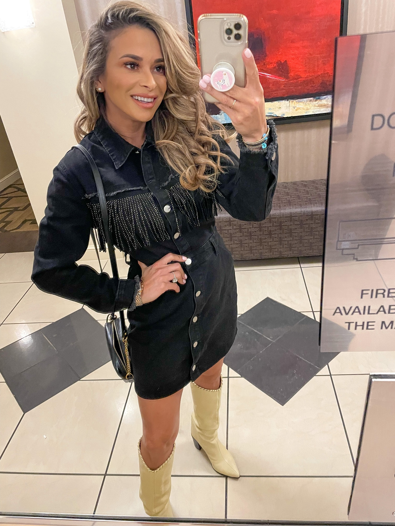 SHOP this cute Fringe Trim Button Front Denim Dress for only $35.00 dollars + 15% discount on their site! Also, @schutz are having a LARGE sale on these boots!! 
