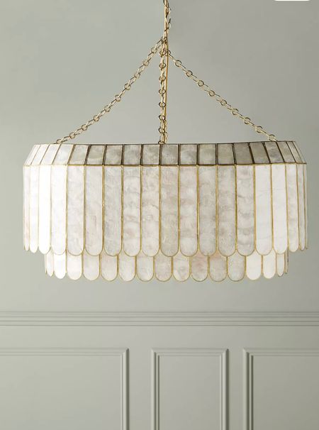 I love anything mother of pearl but when it has scalloped details I’m OBSESSED with it.🥰 it’s just simply stunning!

Scalloped light fixture 
Mother of pearl 
Lightning 
Anthropologie home finds 
Home decor 
Anthropologie lighting 
Dining room light 
Bedroom light 
Sitting room light 
Closet light 

#springoutfits #fallfavorites #LTKbacktoschool #fallfashion #vacationdresses #resortdresses #resortwear #resortfashion #summerfashion #summerstyle #LTKseasonal #rustichomedecor #liketkit #highheels #Itkhome #Itkgifts #Itkgiftguides #springtops #summertops #Itksalealert
#LTKRefresh #fedorahats #bodycondresses #sweaterdresses #bodysuits #miniskirts #midiskirts #longskirts #minidresses #mididresses #shortskirts #shortdresses #maxiskirts #maxidresses #watches #backpacks #camis #croppedcamis #croppedtops #highwaistedshorts #highwaistedskirts #momjeans #momshorts #capris #overalls #overallshorts #distressesshorts #distressedjeans #whiteshorts #contemporary #leggings #blackleggings #bralettes #lacebralettes #clutches #crossbodybags #competition #beachbag #halloweendecor #totebag #luggage #carryon #blazers #airpodcase #iphonecase #shacket #jacket #sale #under50 #under100 #under40 #workwear #ootd #bohochic #bohodecor #bohofashion #bohemian #contemporarystyle #modern #bohohome #modernhome #homedecor #amazonfinds #nordstrom #bestofbeauty #beautymusthaves #beautyfavorites #hairaccessories #fragrance #candles #perfume #jewelry #earrings #studearrings #hoopearrings #simplestyle #aestheticstyle #designerdupes #luxurystyle #bohofall #strawbags #strawhats #kitchenfinds #amazonfavorites #bohodecor #aesthetics #blushpink #goldjewelry #stackingrings #toryburch #comfystyle #easyfashion #vacationstyle #goldrings #fallinspo #lipliner #lipplumper #lipstick #lipgloss #makeup #blazers #LTKU #primeday #StyleYouCanTrust #giftguide #LTKRefresh #LTKSale
#LTKHalloween #LTKFall #fall #falloutfits #backtoschool #backtowork #LTKGiftGuide #amazonfashion #traveloutfit #familyphotos #liketkit #trendyfashion #fallwardrobe

#LTKSale #LTKhome #LTKFind