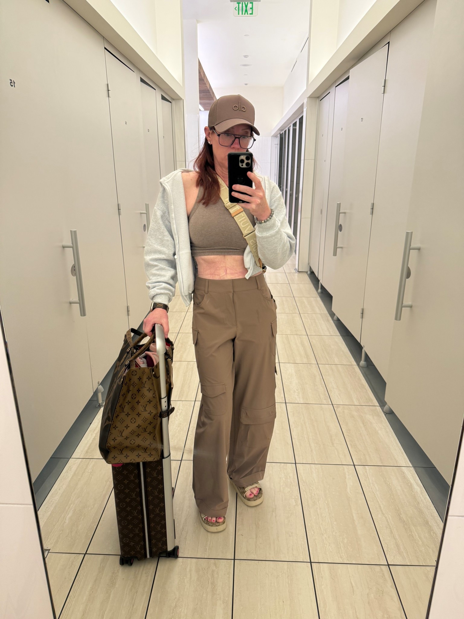 Wearing all my neutrals for a long travel day. Cozy, simple, and still put together—my kind of airport outfit 🤎 #skims #travel #airportfit

#LTKStyleTip #LTKFindsUnder100 #LTKTravel