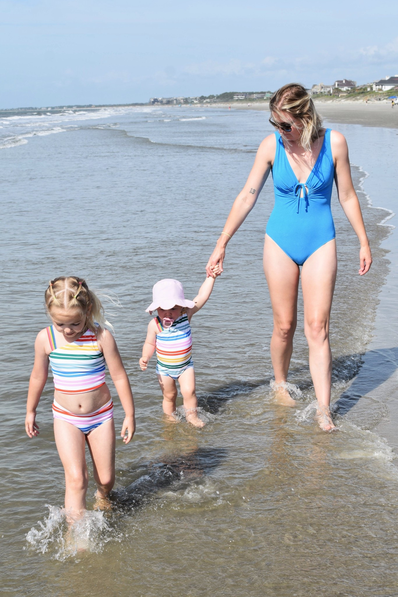 I’ve had the best luck finding one piece swimsuits from Aerie because they offer some styles in lengths! I’m wearing a size medium long here, but would size up to a large long if reordering. The girls are wearing Hanna Andersson which are always so cute and wash well  

#LTKTravel #LTKSeasonal #LTKActive