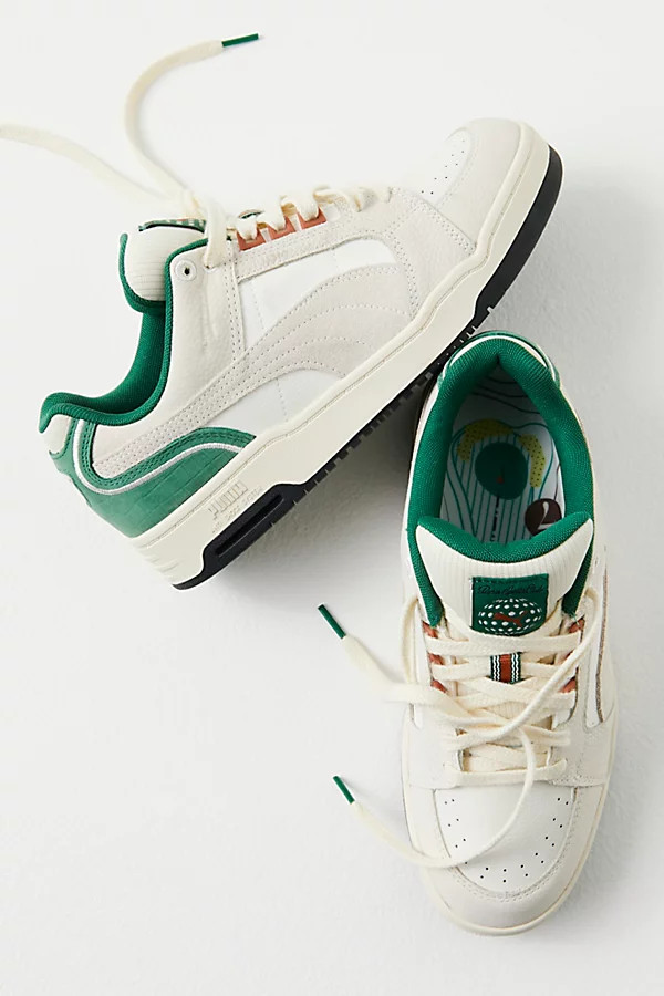 Slipstream Lo Fast Green Sneakers by Puma at Free People, Warm White / Spring Lavvender, US 7 M | Free People (Global - UK&FR Excluded)