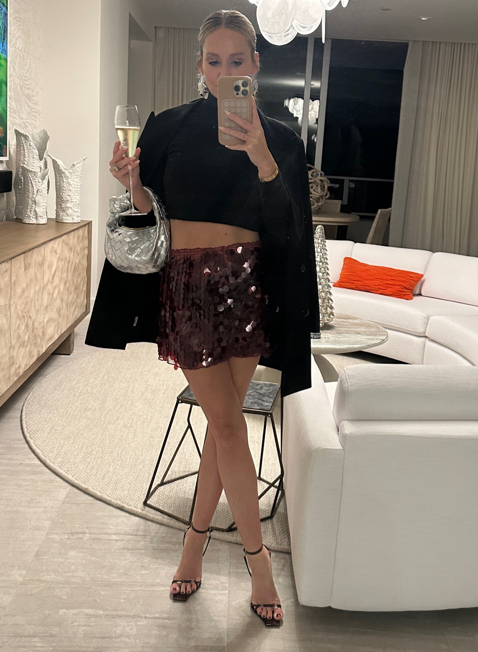 sequin skirt + crop black turtleneck 

#LTKtravel #LTKstyletip #LTKSeasonal