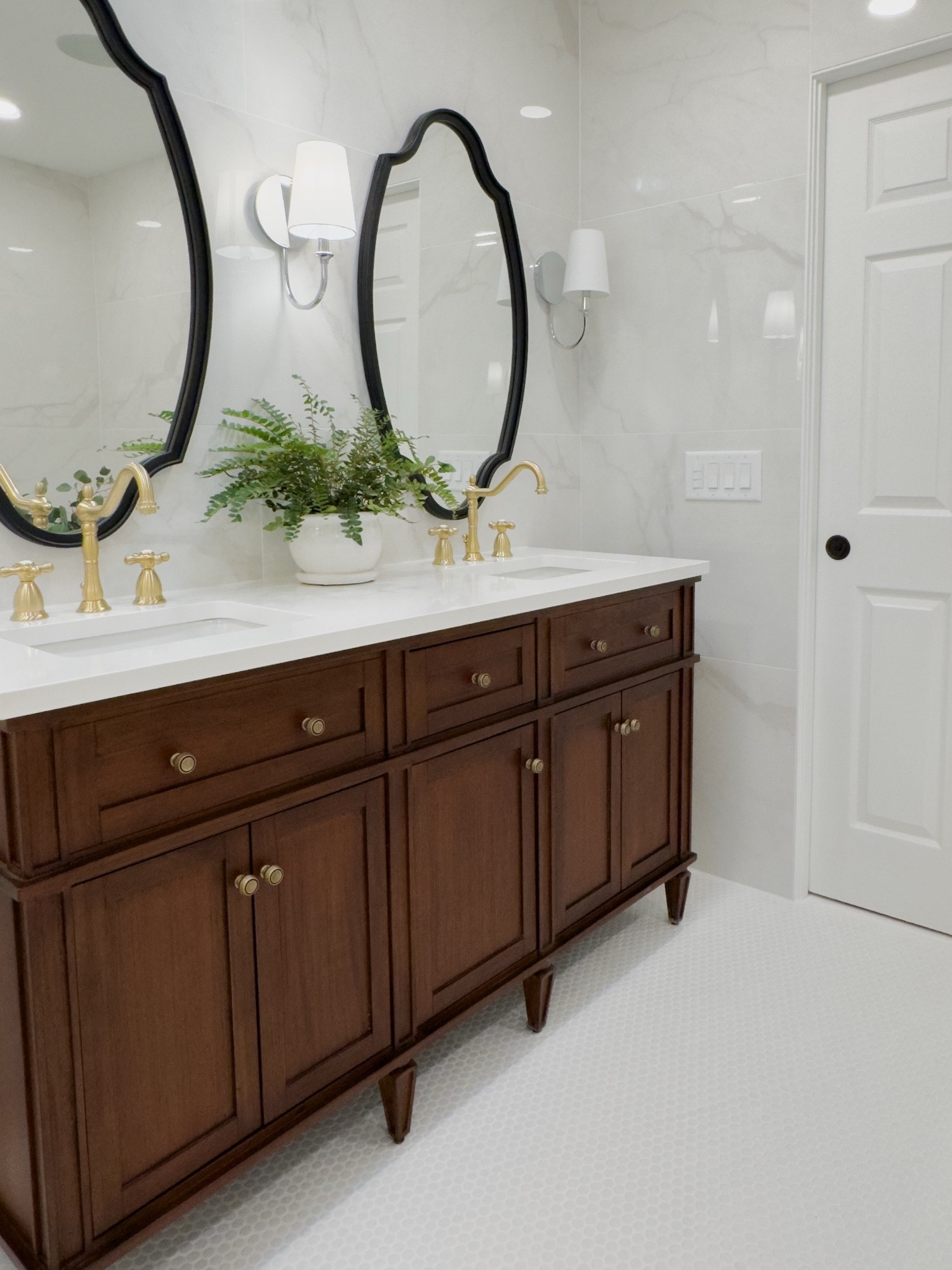A master bathroom refresh turned into a full wet room! Vanity, faucets, lighting and more!

#LTKHome #LTKvlog #LTKSaleAlert