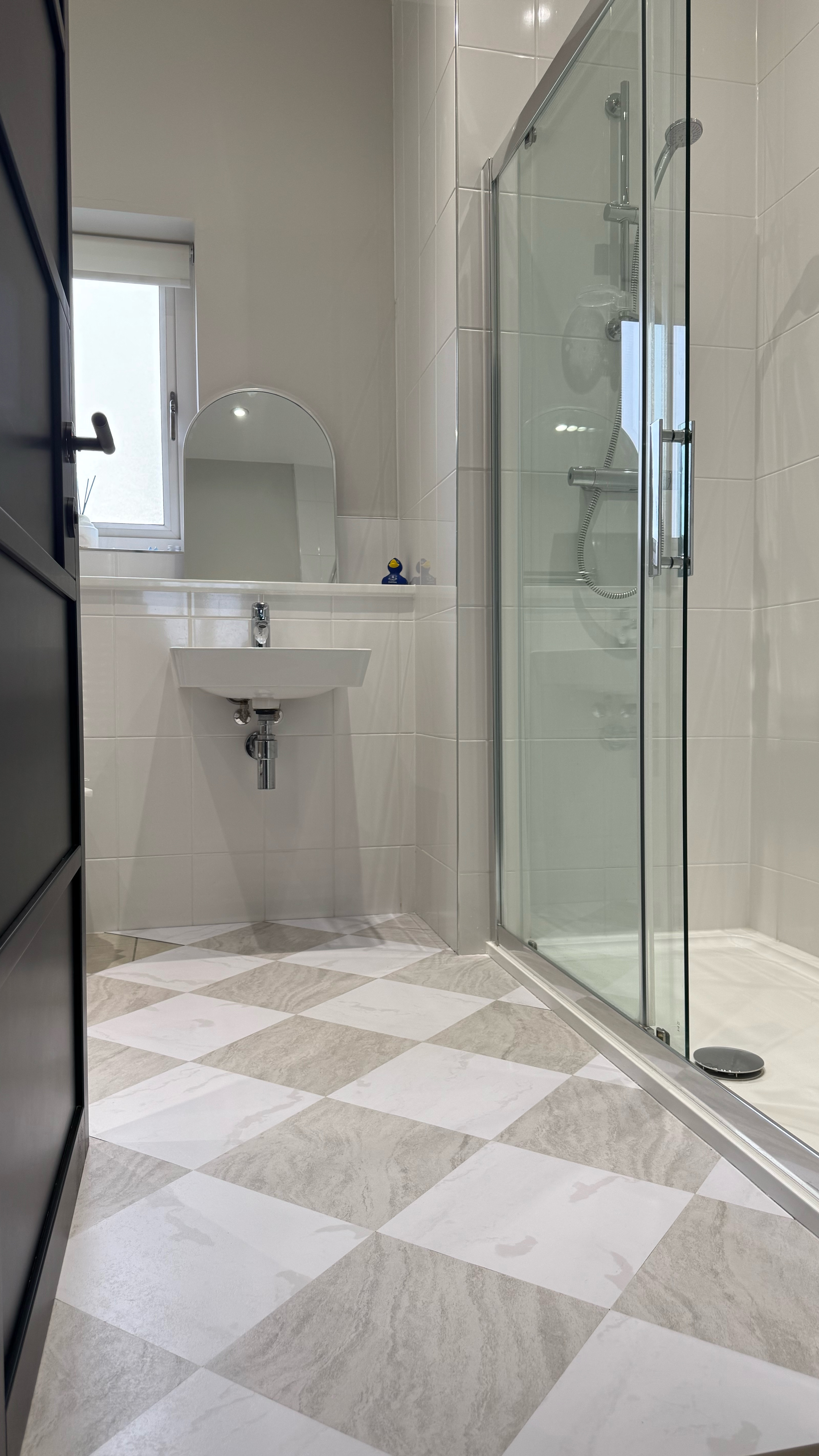 Peel and stick marble floor tiles for the win! 🫶🏻

Loads of you know how much I’ve hated the original tiles in here, but having just done a full ensuite renovation the budget definitely needs refilling! However when I saw these peel and stick tiles at £15 a pack, I thought they were surely worth a go and they inspired me to give this bathroom a little glow up. I can’t change the white tiles but I can:
- add some gorgeous wallpaper
- paint the ceiling, do up the floor
- add a vanity to the sink
- make a shaker style bath panel
- and of course upgrade the floors
and I have a feeling it’s really going to switch up the feel of this room!

#LTKuk #LTKhome