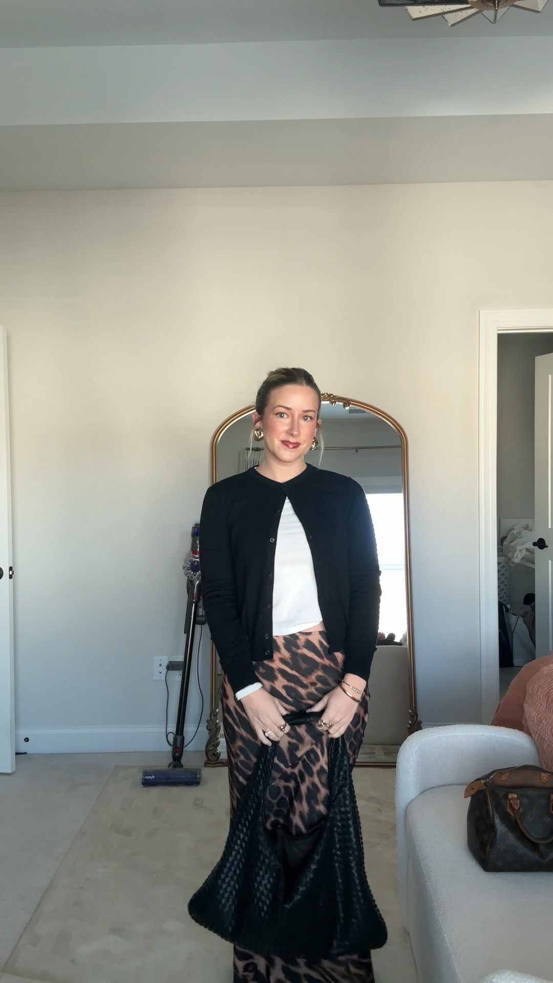 In Office Day Outfit of the Day | I looove a maxi skirt .. especially in leopard! So easy to pair with a plain white tee, cardigan, and some knee high boots 🖤 

#LTKFindsUnder100 #LTKWorkwear #LTKSeasonal