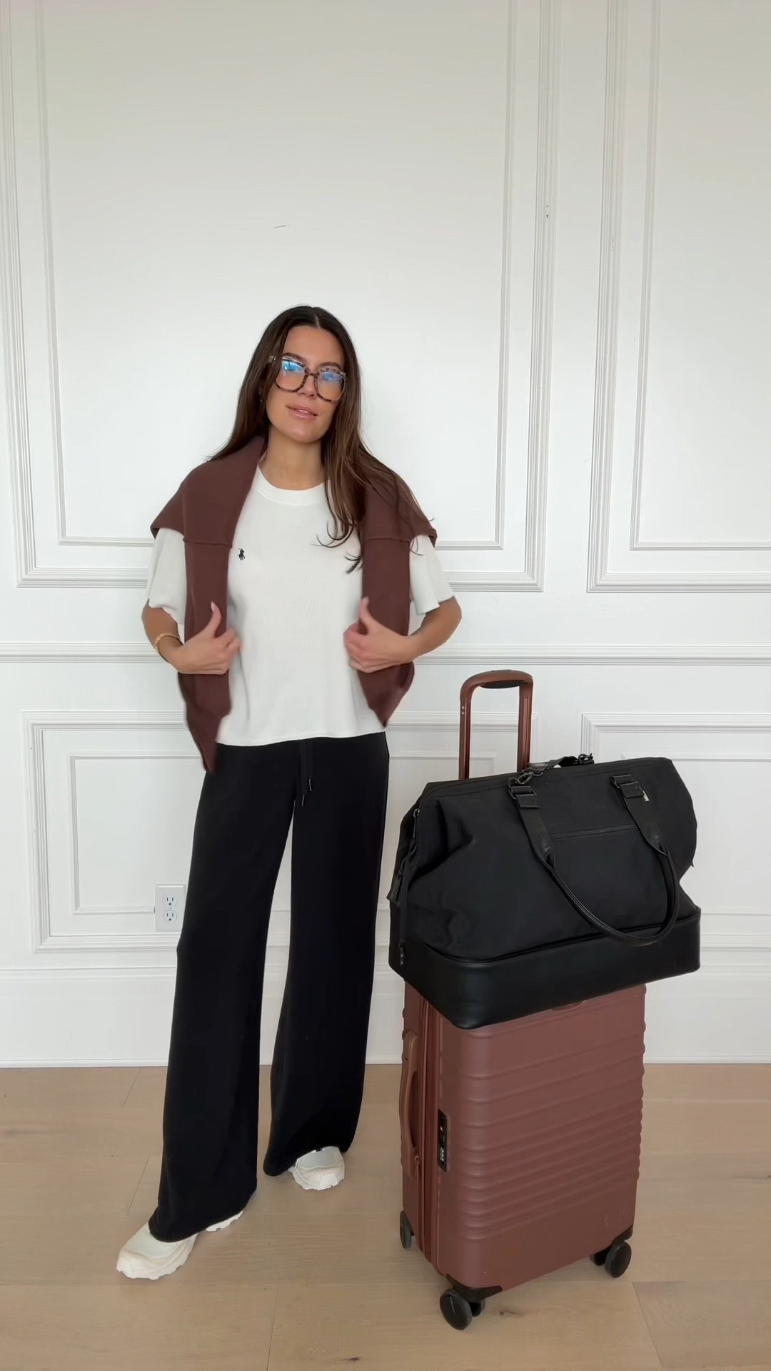 Travel outfit for the airport ✈️  my favorite luggage and this polo shirt is actually part of a pj set but it’s so comfy for traveling! 

Wearing size small in polo Ralph Lauren set 
Small in pants too 

#LTKWatchNow #LTKTravel #LTKStyleTip