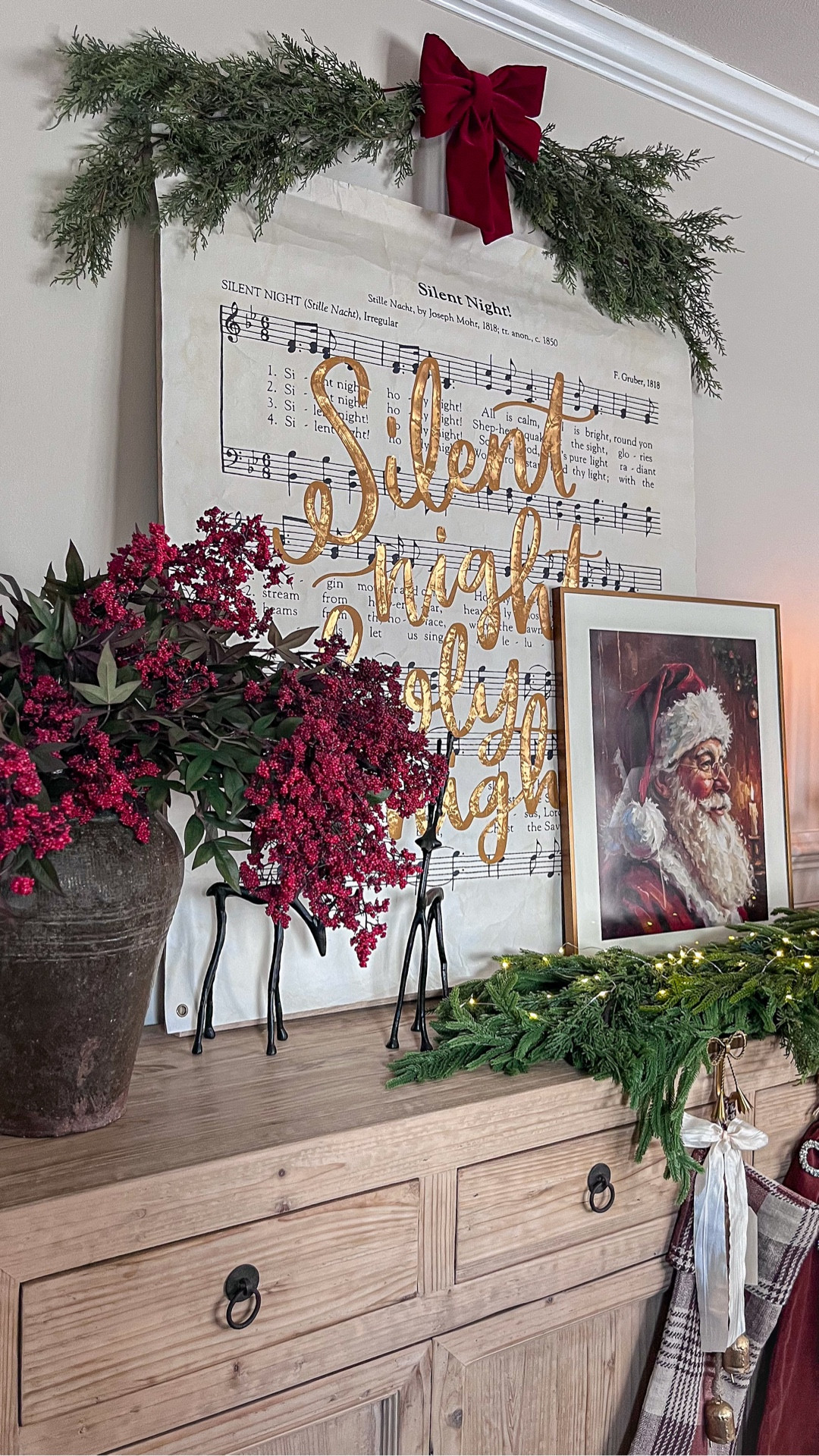 My sideboard styled for Christmas… a little vintage, a little cozy 🌲 ❤️✨

|Sideboard| |Silent Night| |Berry Stems| |Garland| |Vintage Santa| |Metal Reindeer|

#LTKHoliday #LTKHome #LTKSeasonal